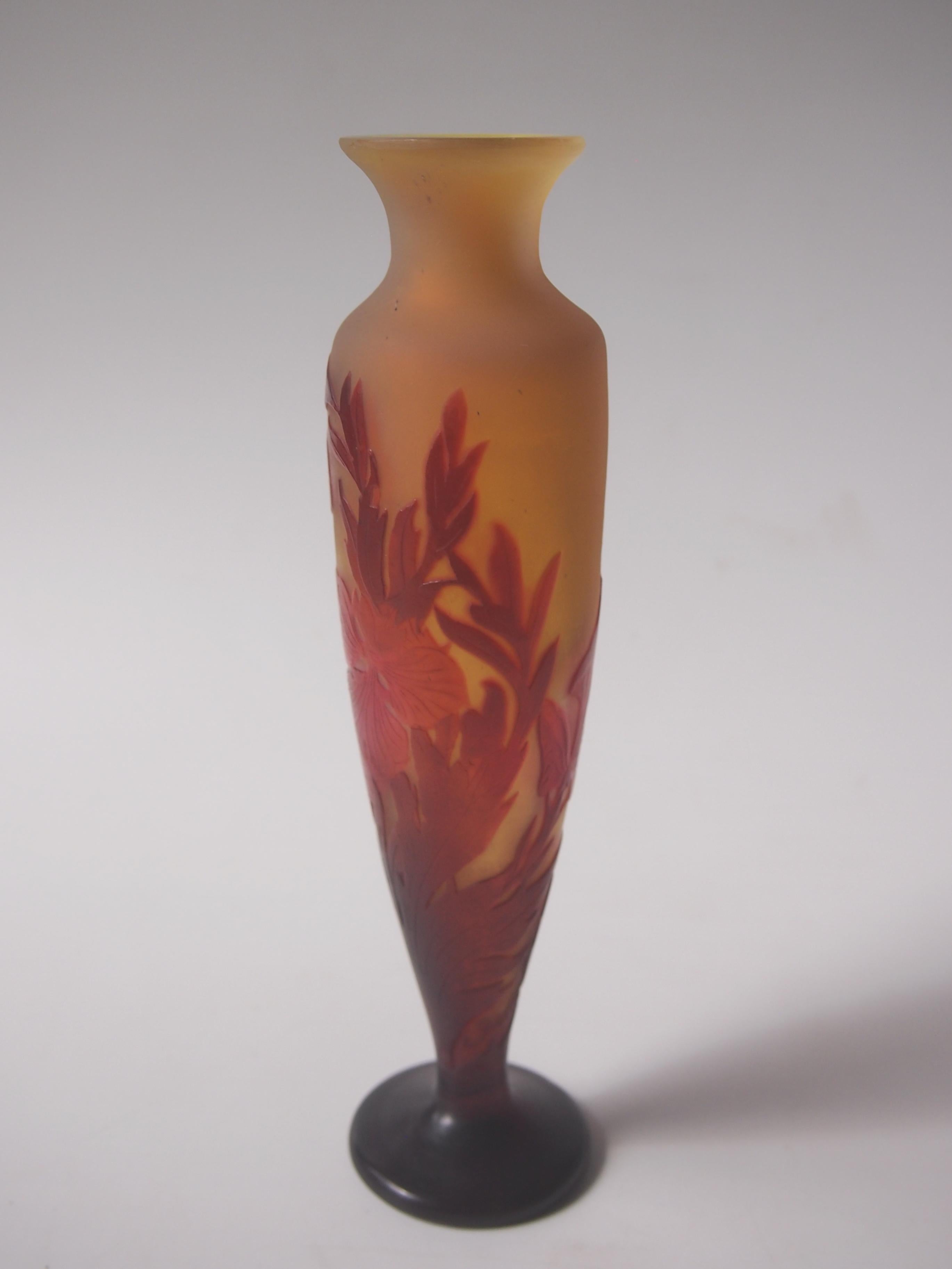 Fine small signed French Art Nouveau Emile Galle footed cameo vase depicting flowers in reds over orange -with fine internal polishing to highlight the red in the flowers -(this is sometimes called window pane technique one of the more complex