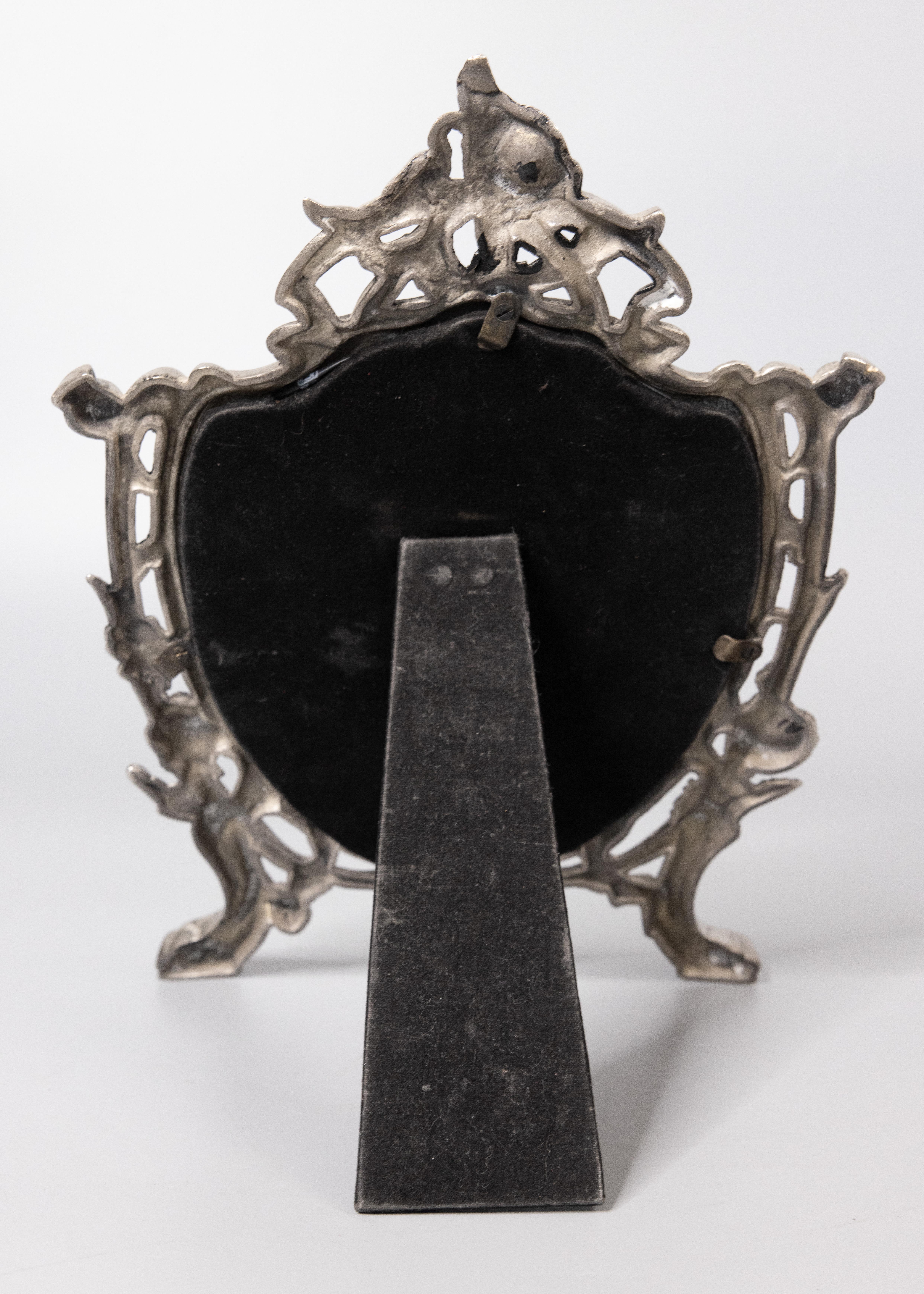 antique silver backed mirror