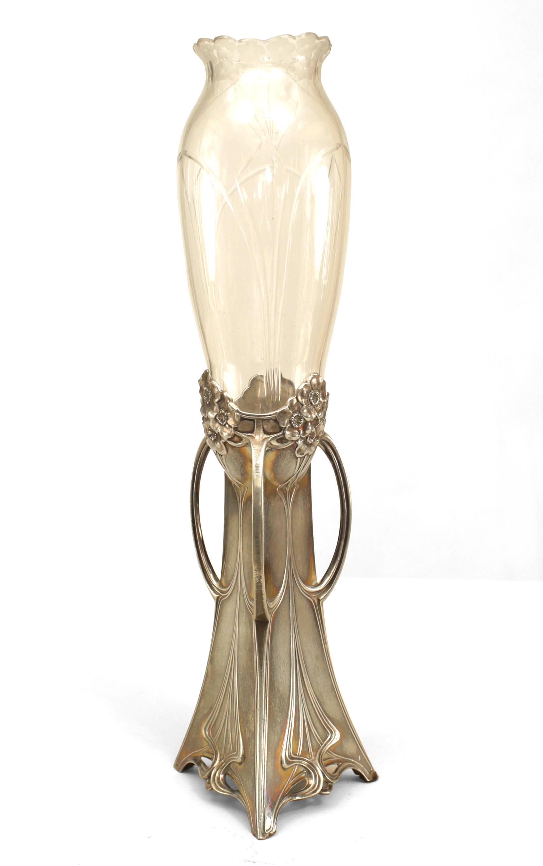 French Art Nouveau silvered metal bud vase with removable etched glass inset within a base cast with a woman playing the harp (WMF).
 