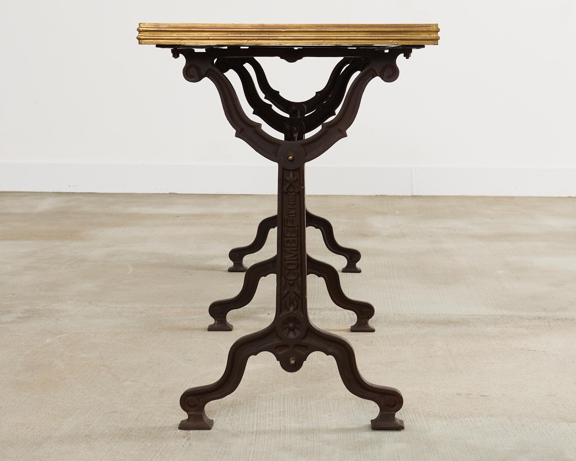 Table Art nouveau français à triple piédestal en fer et bronze en vente 2