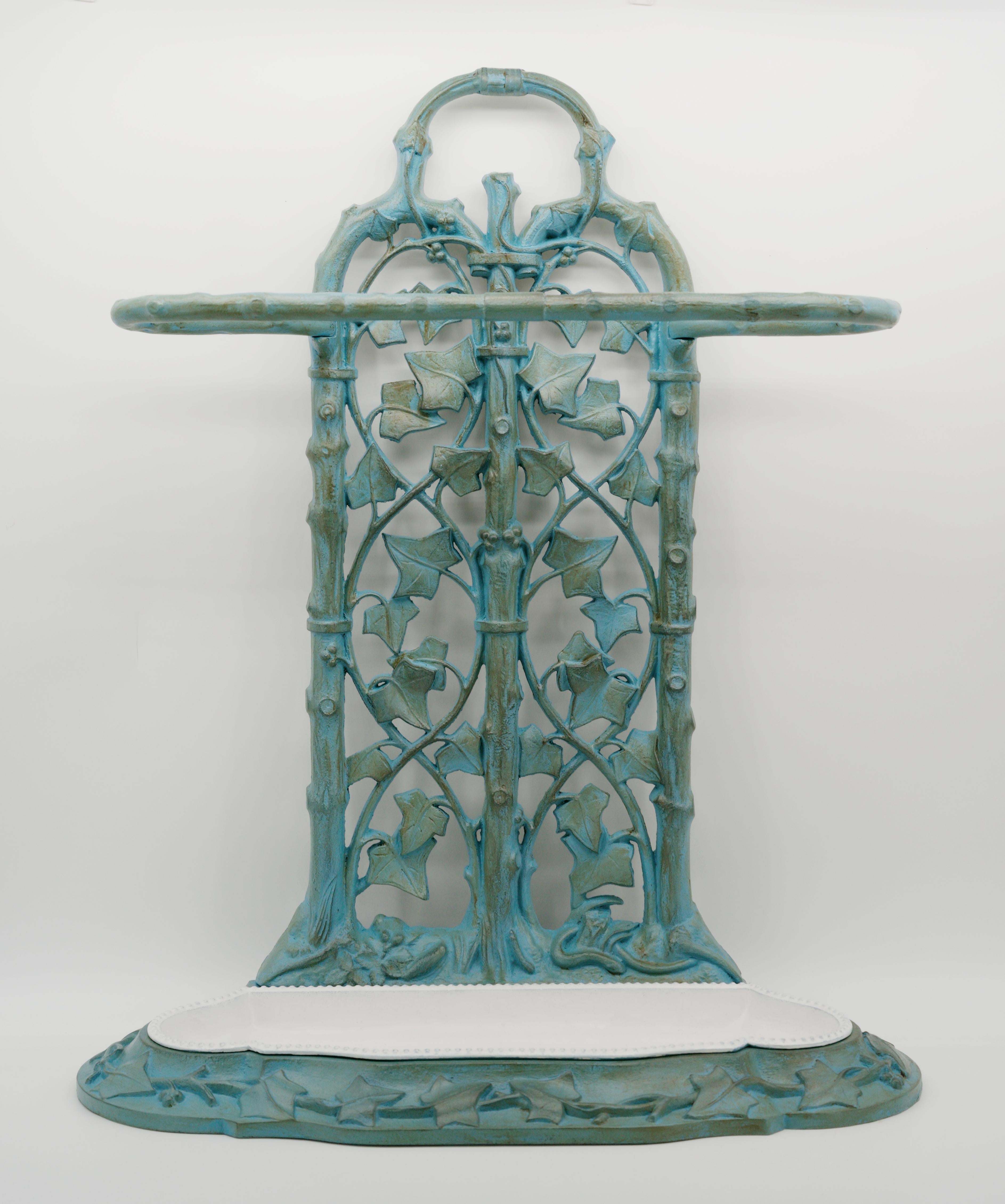 French Art Nouveau umbrella stand, France, ca.1900. Patinated cast iron. Removable tank. Height: 28.7