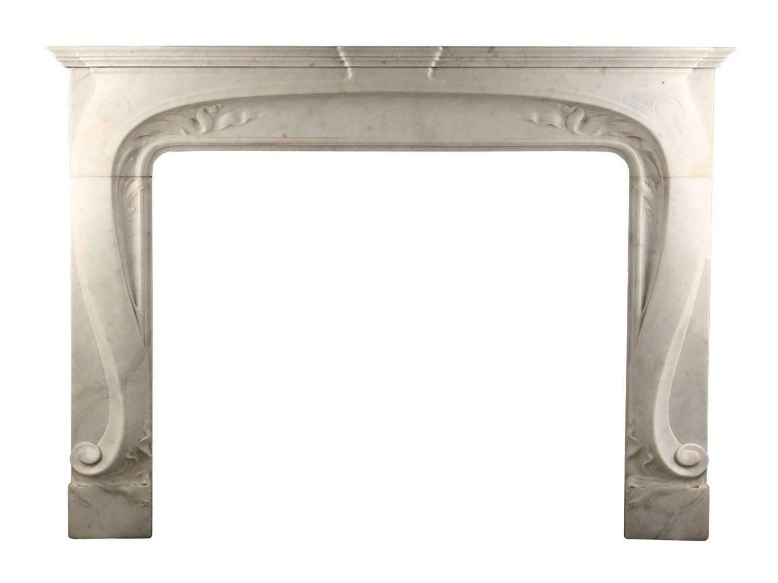 French Art Nouveau white carrara marble mantelpiece.

Depth: 16? – 40.6 cm
External height: 43 1/2” – 110.4 cm
External width: 60? – 152.4 cm
Internal height: 34 1/2? – 87.6 cm
Internal width: 42? – 106.6 cm.
 