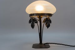 French Art Nouveau White Iridescent Glass and Wrought Iron Table Lamp, 1920s