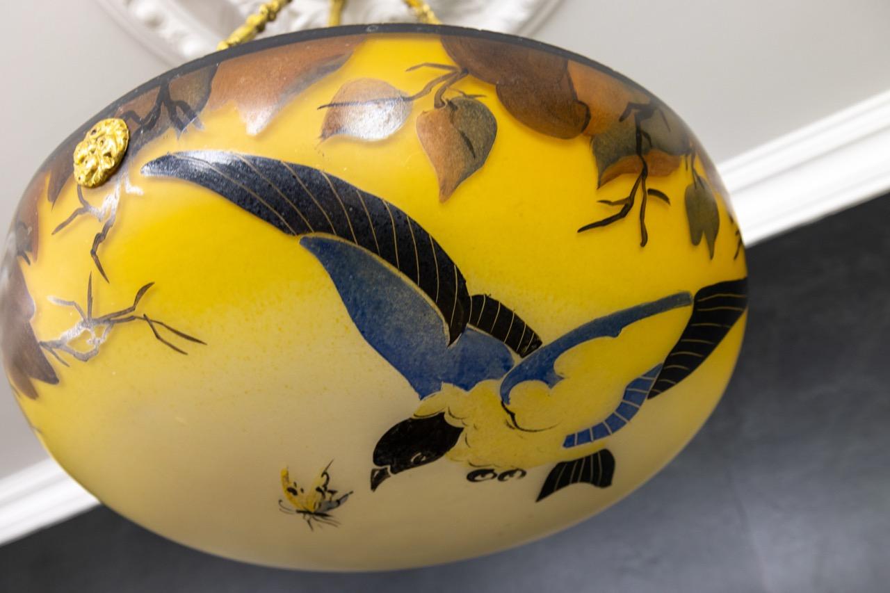 Brass French Art Nouveau Yellow and Brown Painted Glass Pendant Light with Bird, 1920s