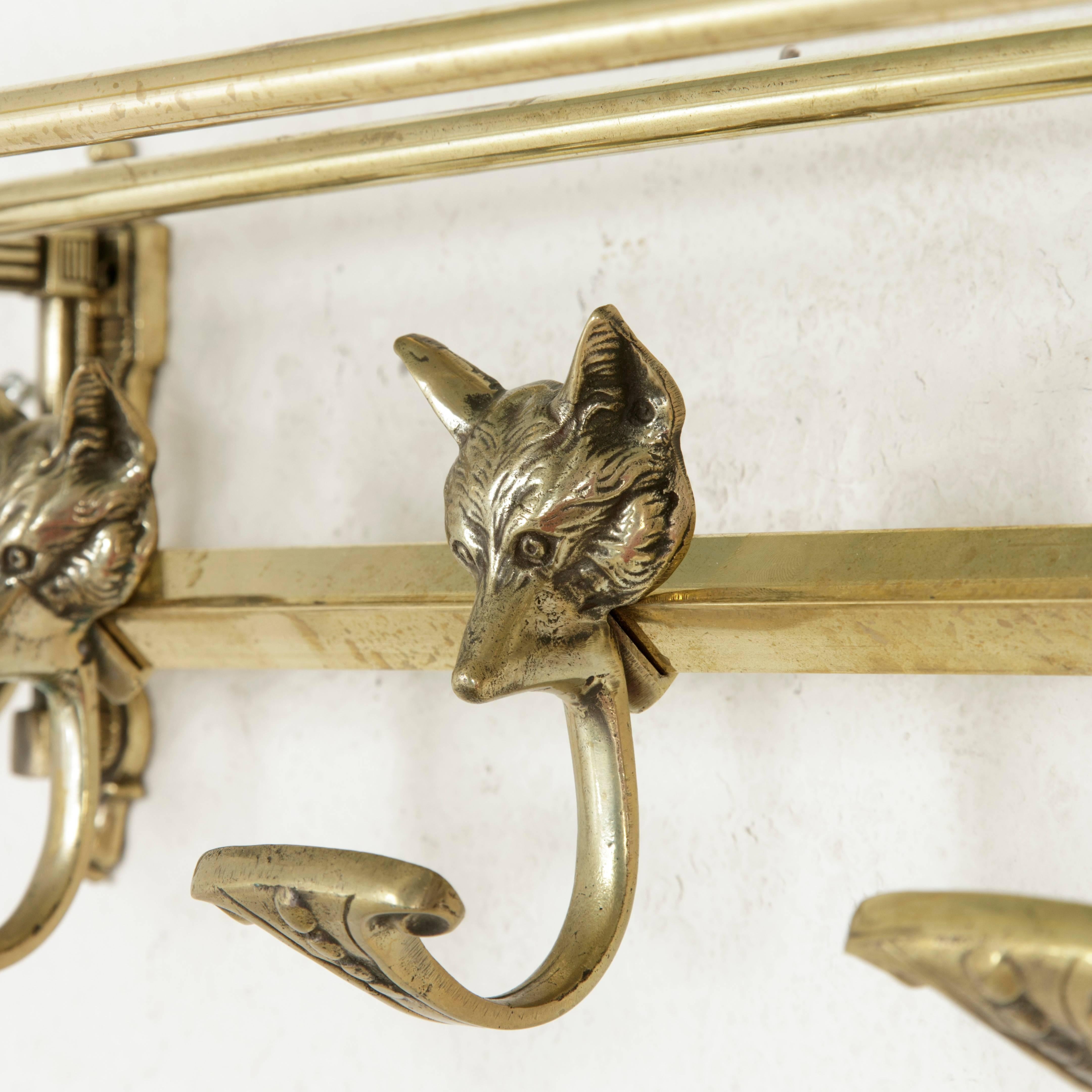 Cast French Artisan-Made Brass Hat and Coat Rack with Four Hooks Featuring Fox Heads