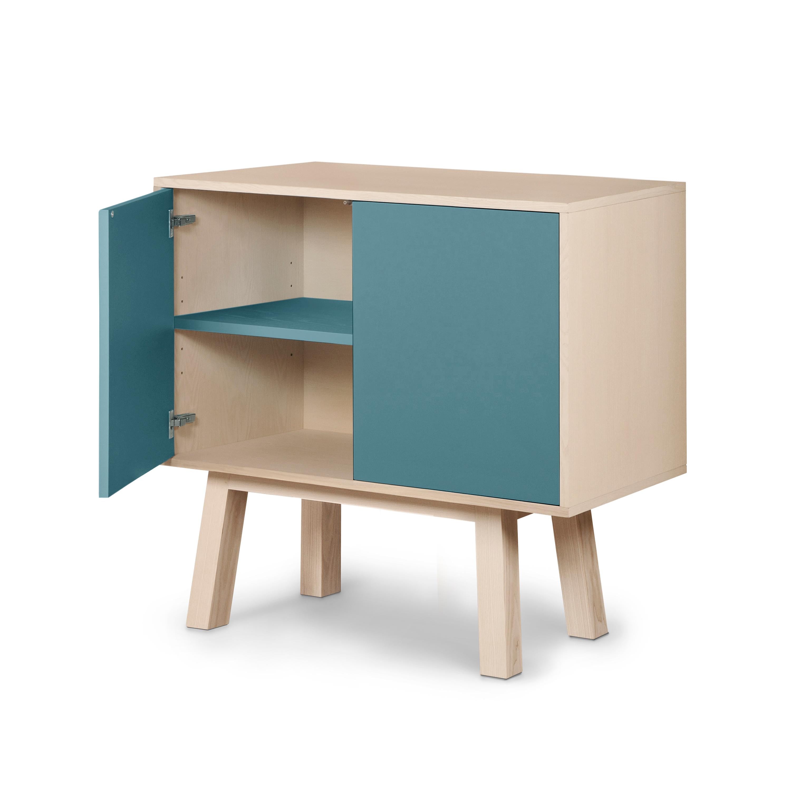 Lacquered French artisanal 2-door light blue high wooden cabinet, by Eric Gizard, Paris For Sale