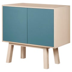 French artisanal 2-door light blue high wooden cabinet, by Eric Gizard, Paris