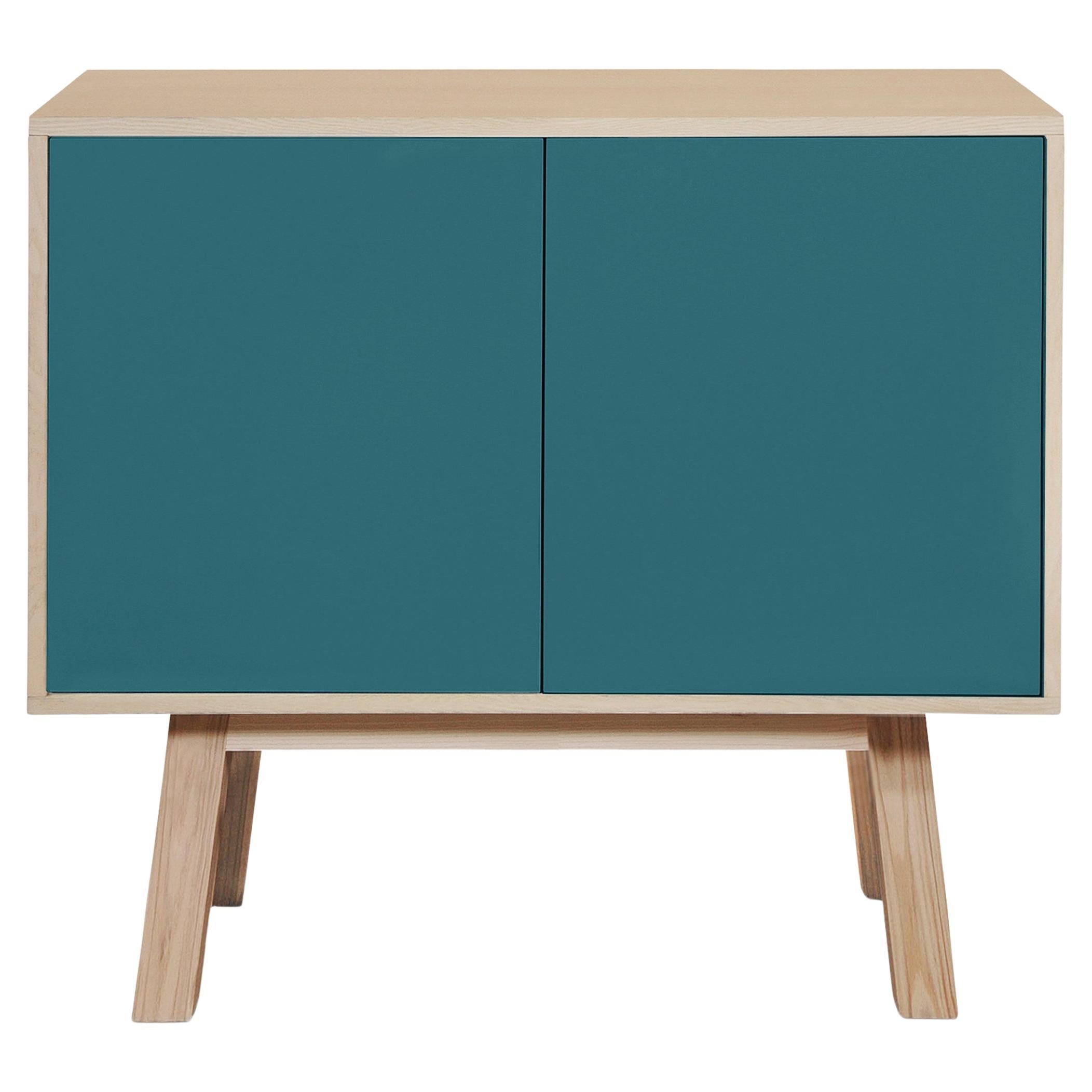 French artisanal 2-door sea blue high wooden cabinet, by Eric Gizard, Paris