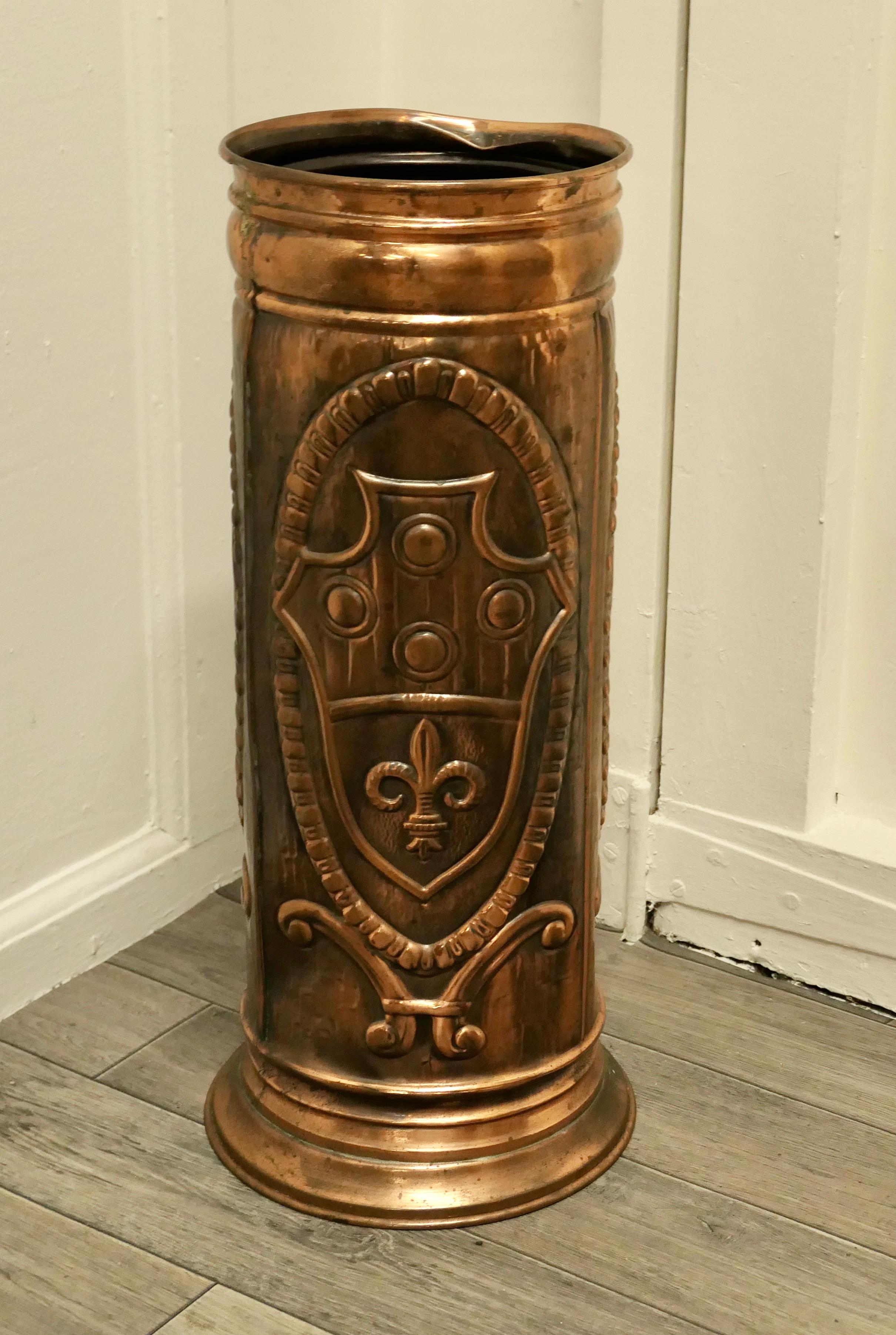 French Arts and Crafts embossed copper stick stand, umbrella stand.

This good looking piece is round in shape with an embossed Bretton Crest.
The Stick stand is in good condition with one small dent this does not affect the strength of the stand,