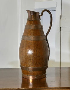 French Arts and Crafts Golden Oak Cider Jug with Copper Bands