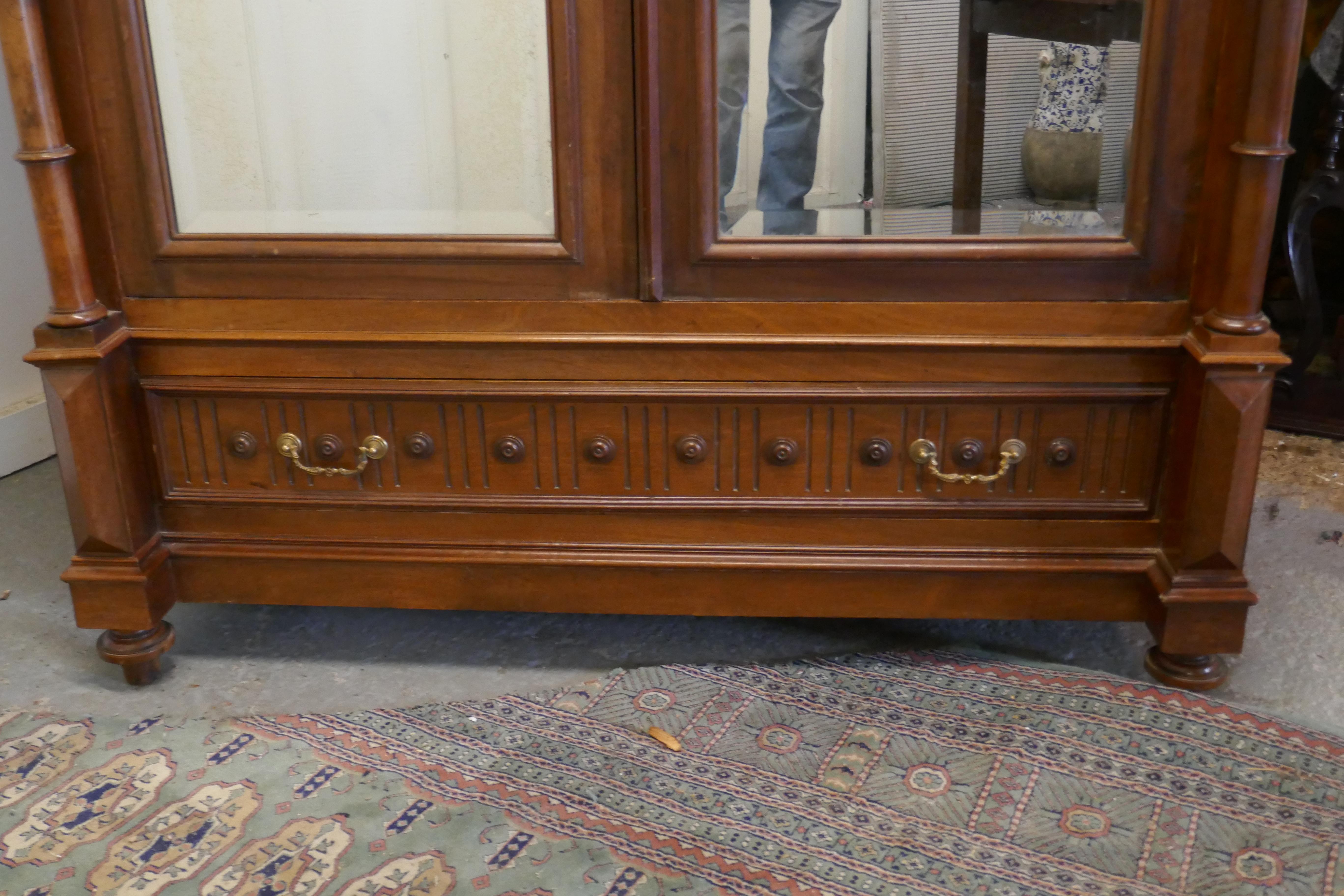Late 19th Century French Arts & Crafts Walnut Mirror Double Door Armoire For Sale