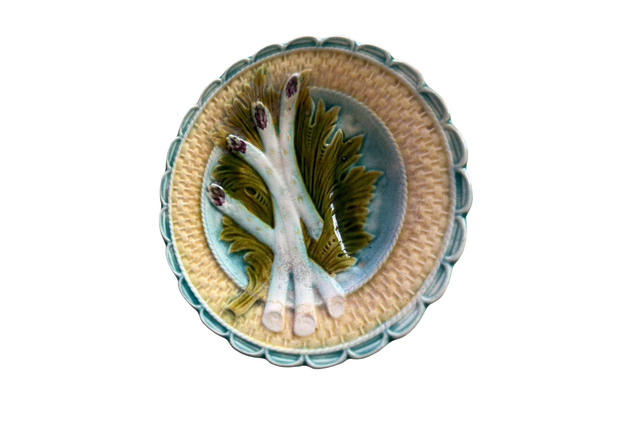 An antique asparagus plate with aqua and lemon. I adore the colors in this plate! It brings the coastal vibe for me and would work beautifully hung in any room. Plate with a scalloped edge. Some grazing as expected with age. France, circa 1890s.