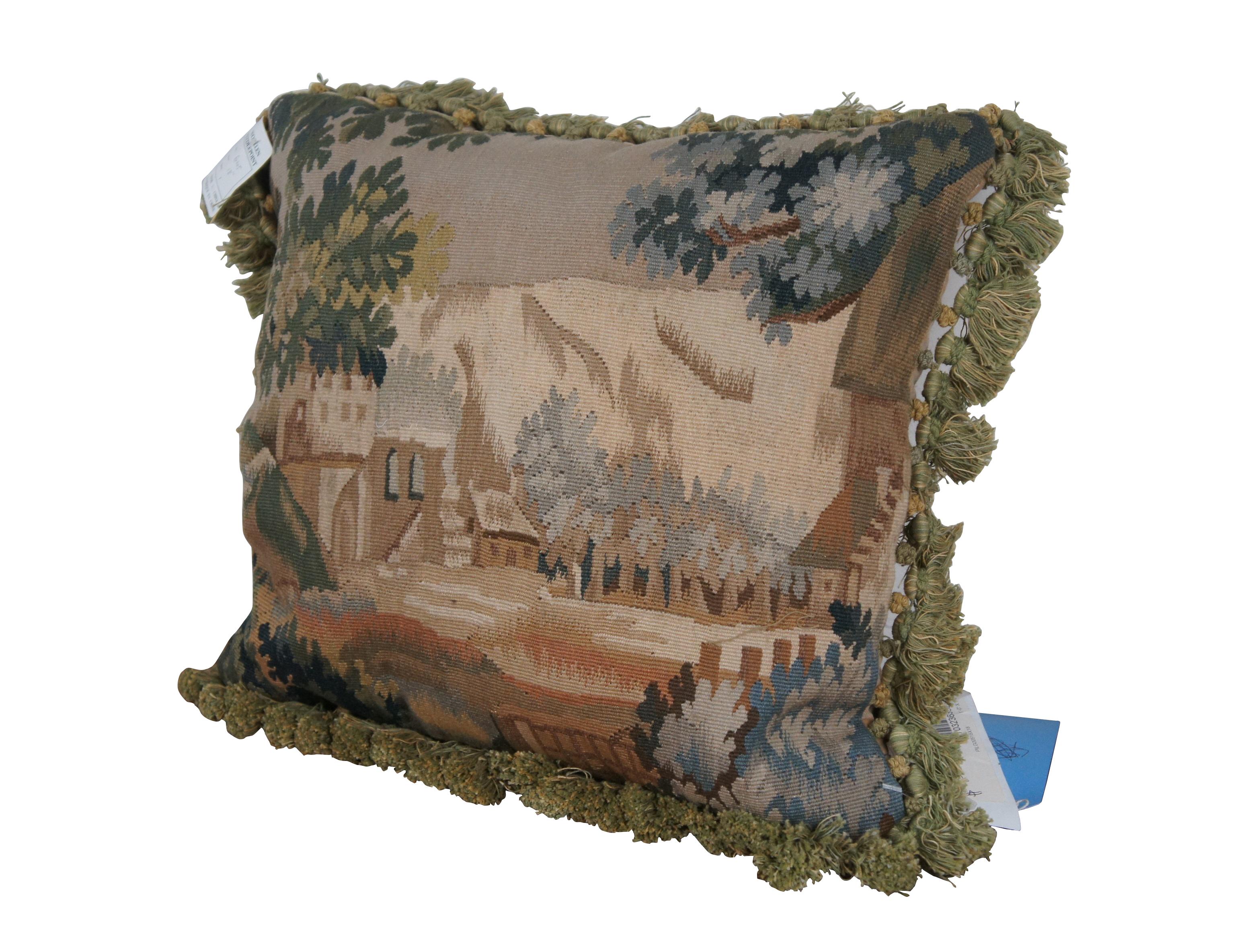 4 Available - 20th century French Aubusson style square throw pillow, embroidered in wool with a castle peeping through a forested landscape. Down Filled. Green and gold tassel trim. Light brown velour back with zipper closure. 

Dimensions:
18