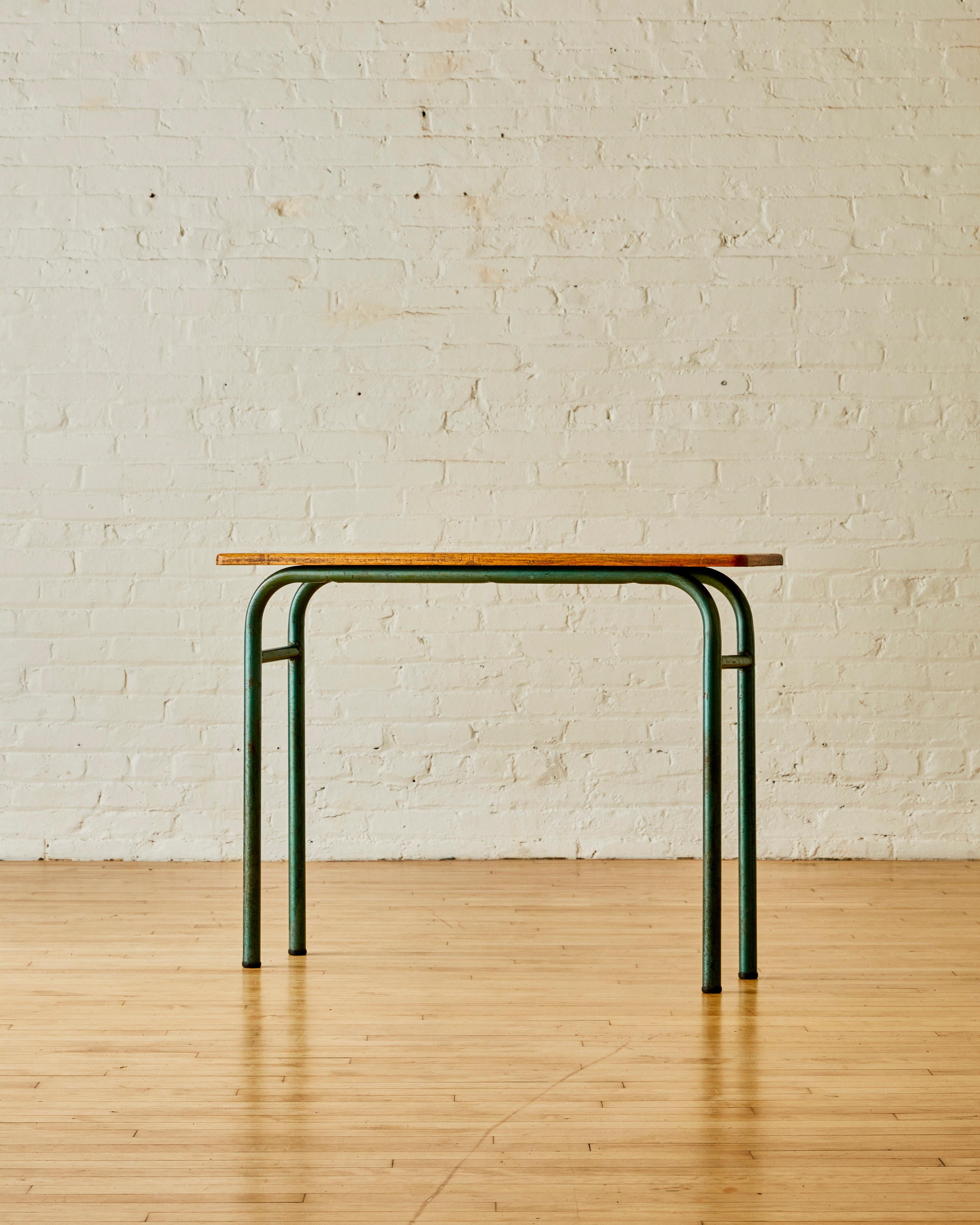 French Auditorium Table with wood top and metal base. 

