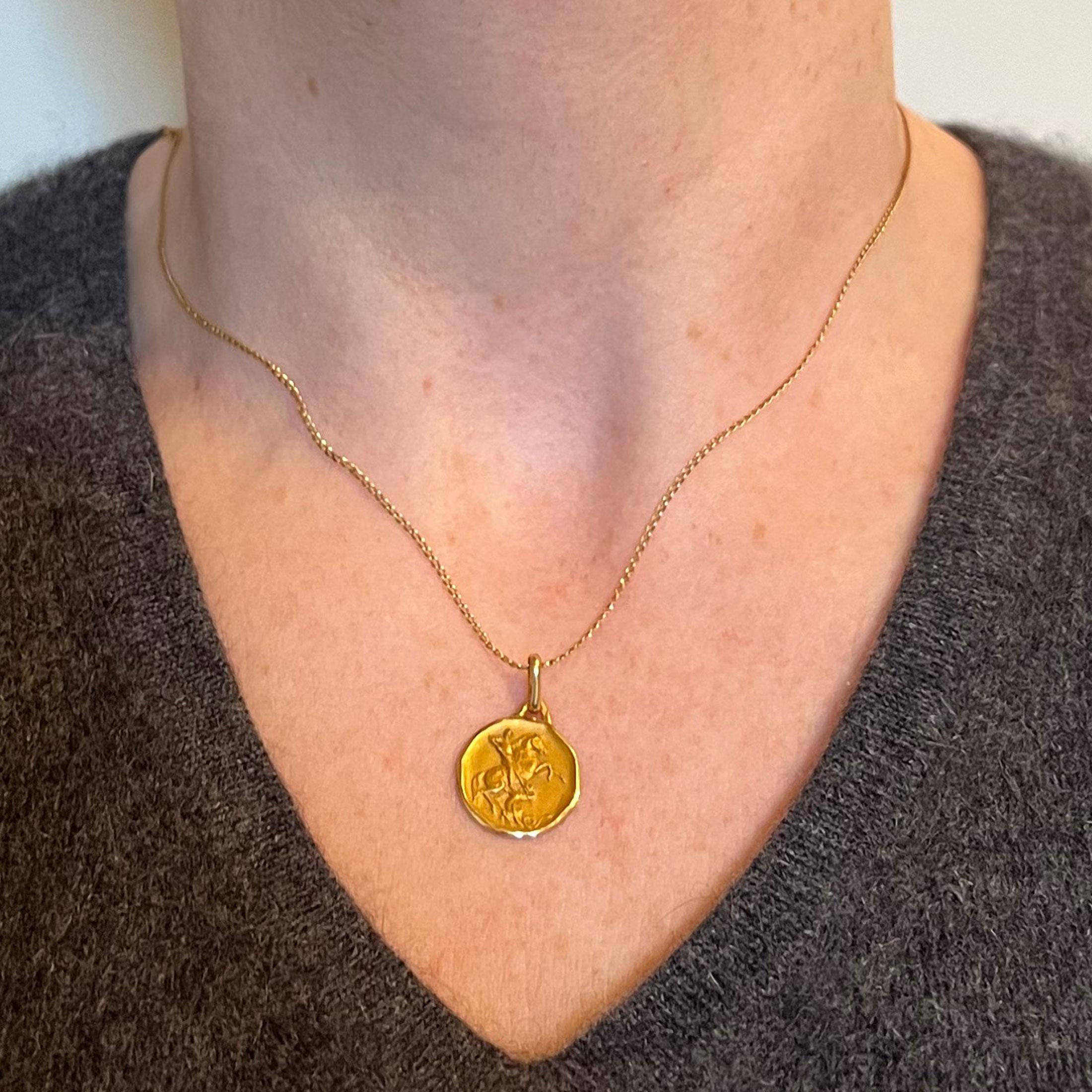 st george gold pendant