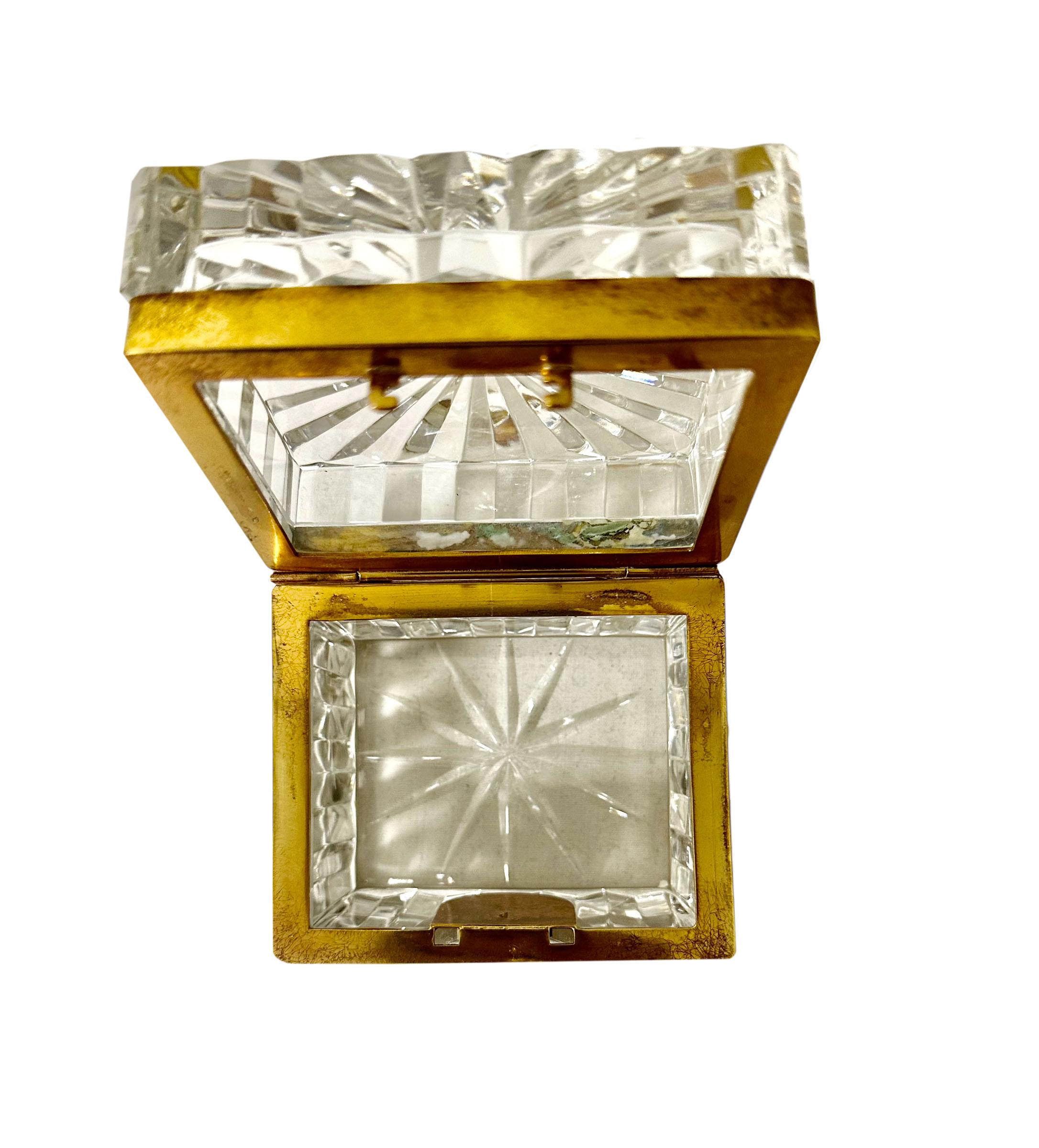 A stunning 19th century French Baccarat crystal box with bronze dore mounts and key. Not signed. This exquisite piece exudes elegance and refinement in every facet.