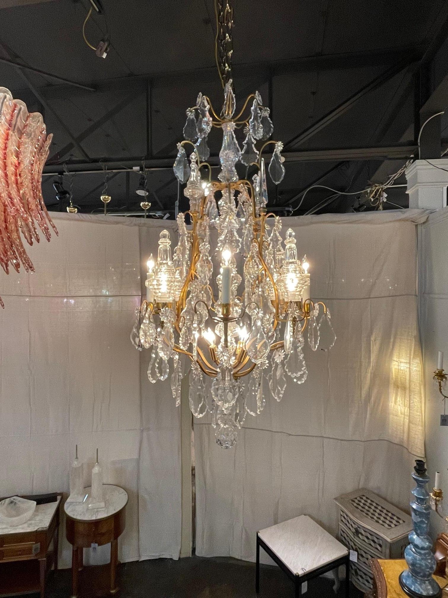 Fine 19 century French Baccarat crystal and Dore' bronze chandelier, Circa 1870. The chandelier has been professionally re-wired, cleaned and is ready to hang. Includes matching chain and canopy.
   