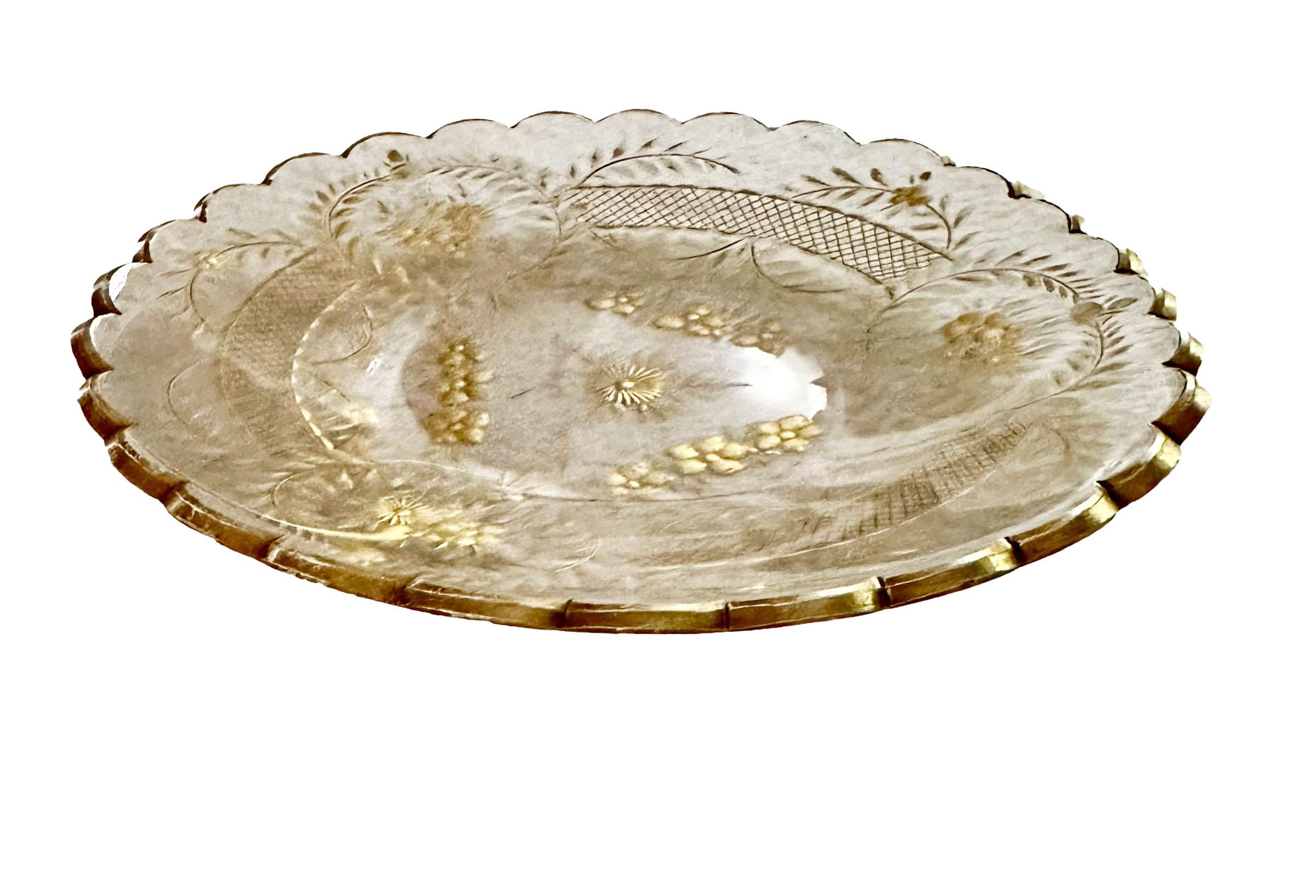 A beautiful French Baccarat style plate with gold florals and scalloped edge. Circa 1915, France. 