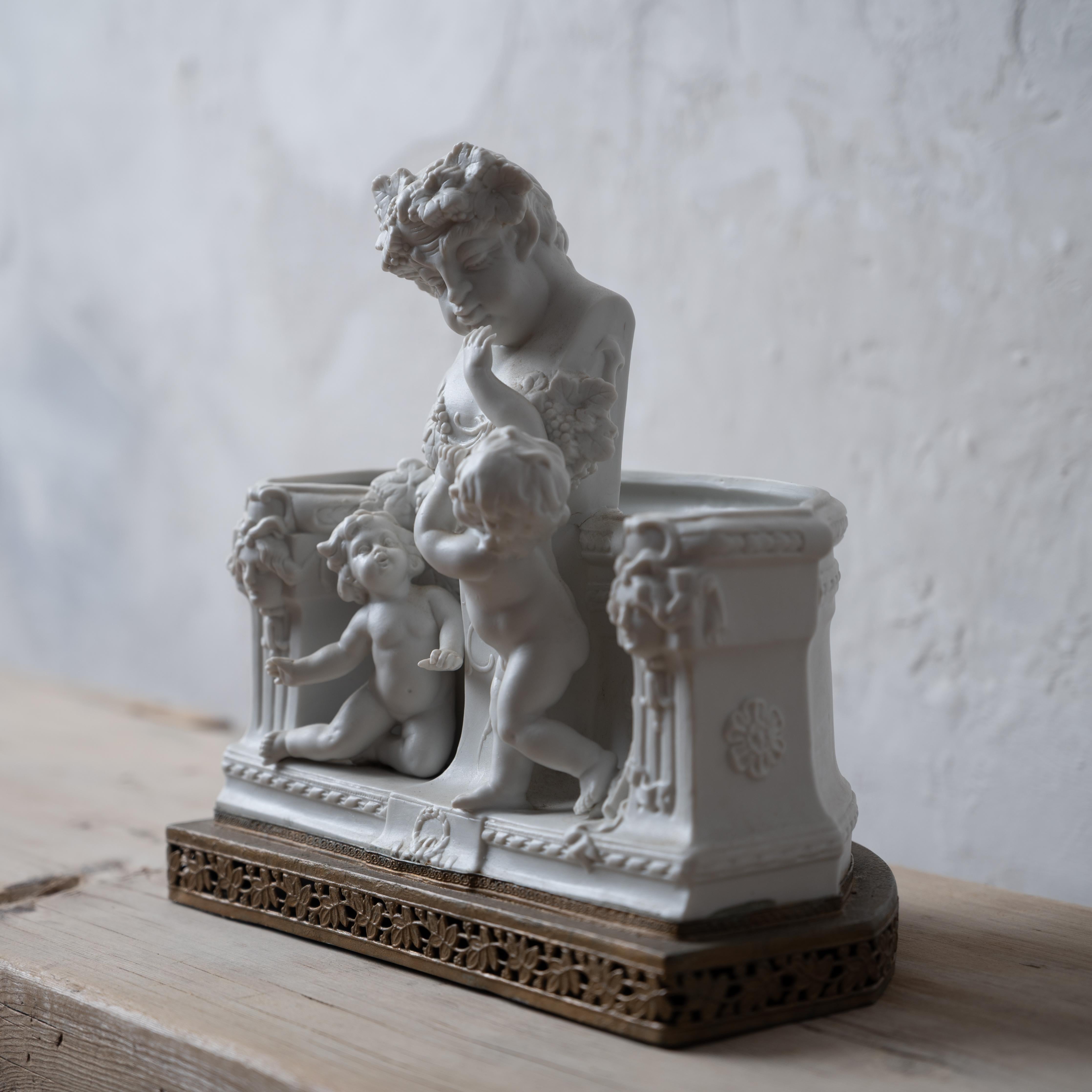 French Bacchus & Putti Bisque Jardiniere In Good Condition For Sale In Savannah, GA