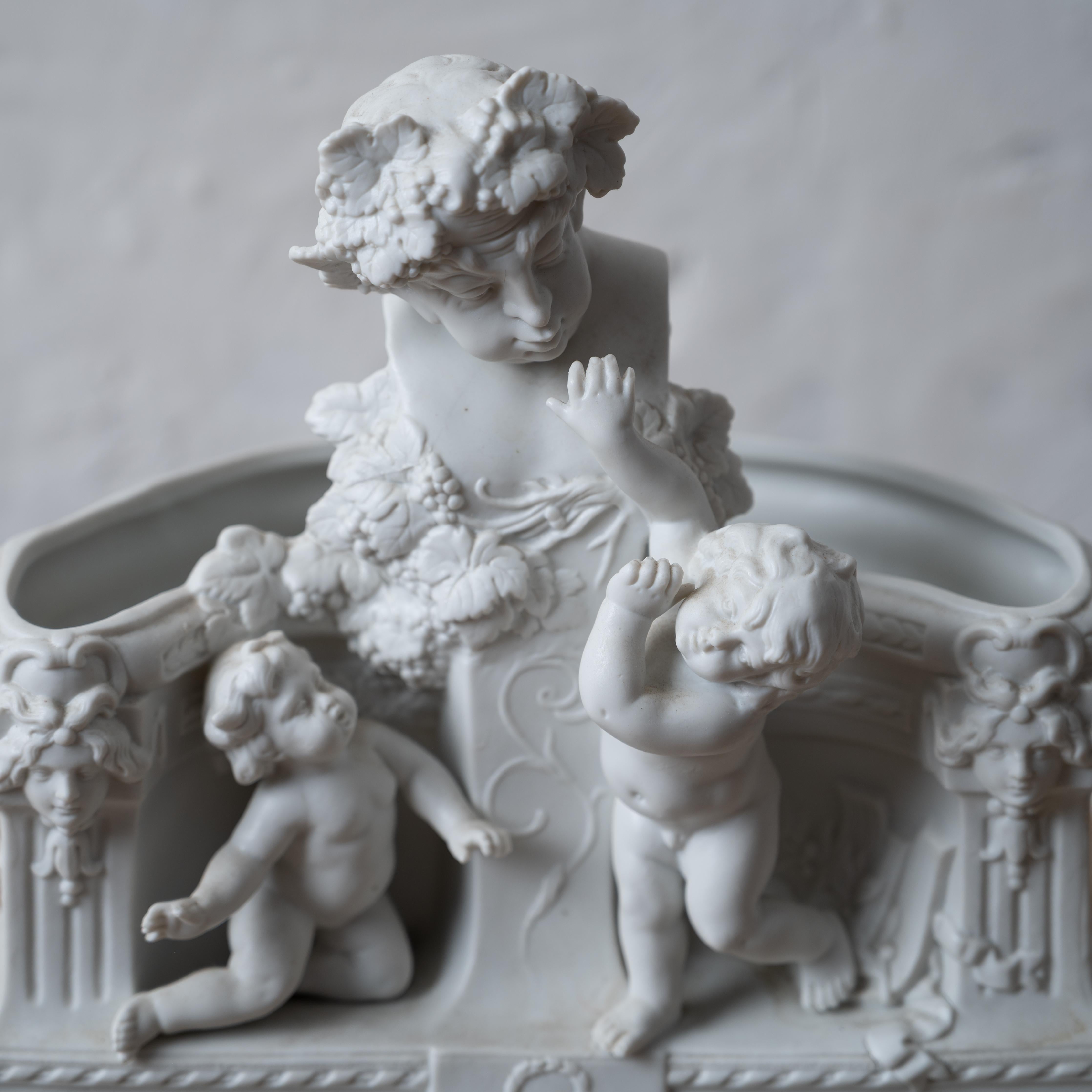 19th Century French Bacchus & Putti Bisque Jardiniere For Sale