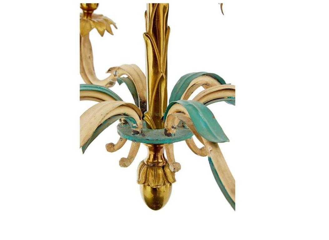 1960s French Baguès brass palm chandelier. High quality polished brass decorated with green and cream painted leaves to form a palm shape. Brushed brass top with chain supports.