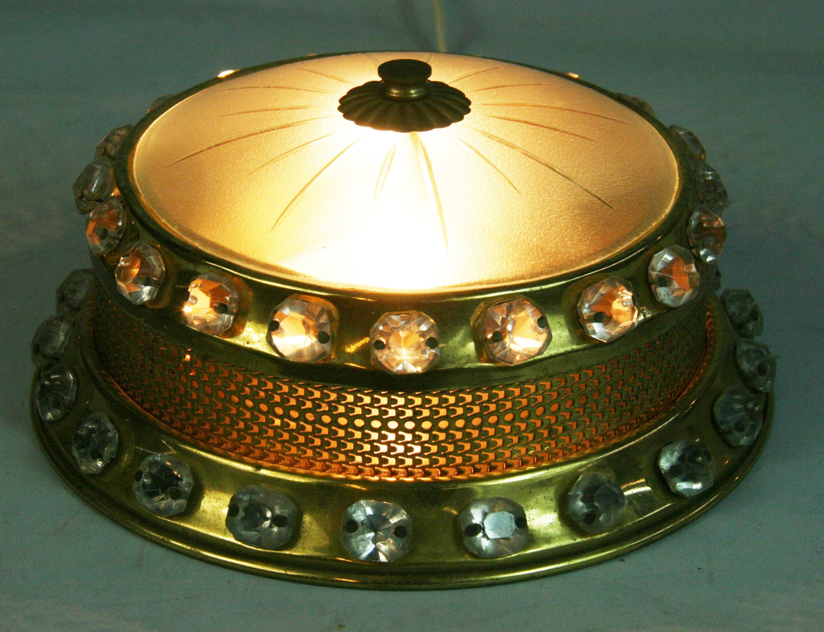 1609 Brass open mesh band with incised crystal bands on top and bottom. Two internal bulbs 40 watt max candelabra based each.
 Wheel cut frosted glass lense.
Rewired

 
