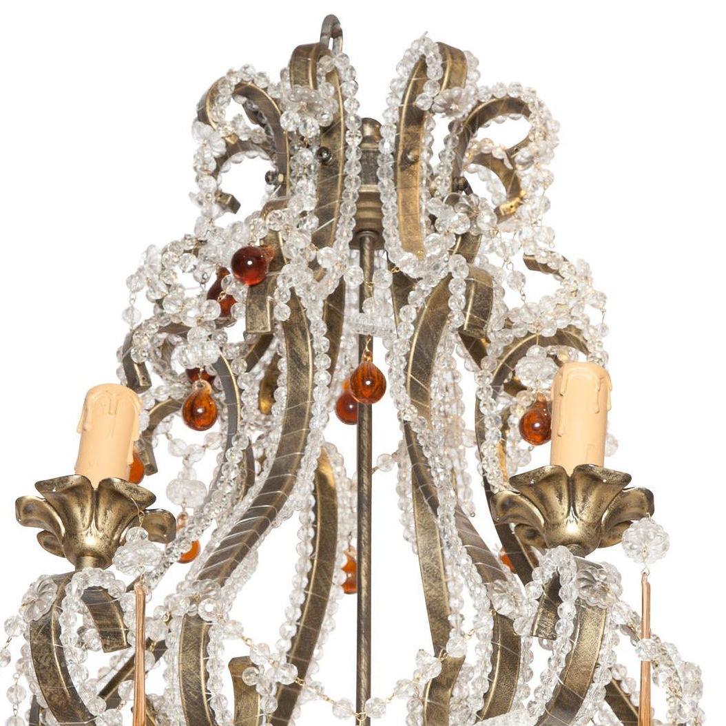 French Bagues style steel and beaded glass chandelier with amber glass pendants.