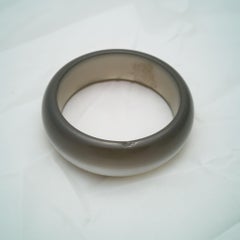 Bracelet jonc en bakélite française, Art déco, années 1920, argent/noir irisé transparent