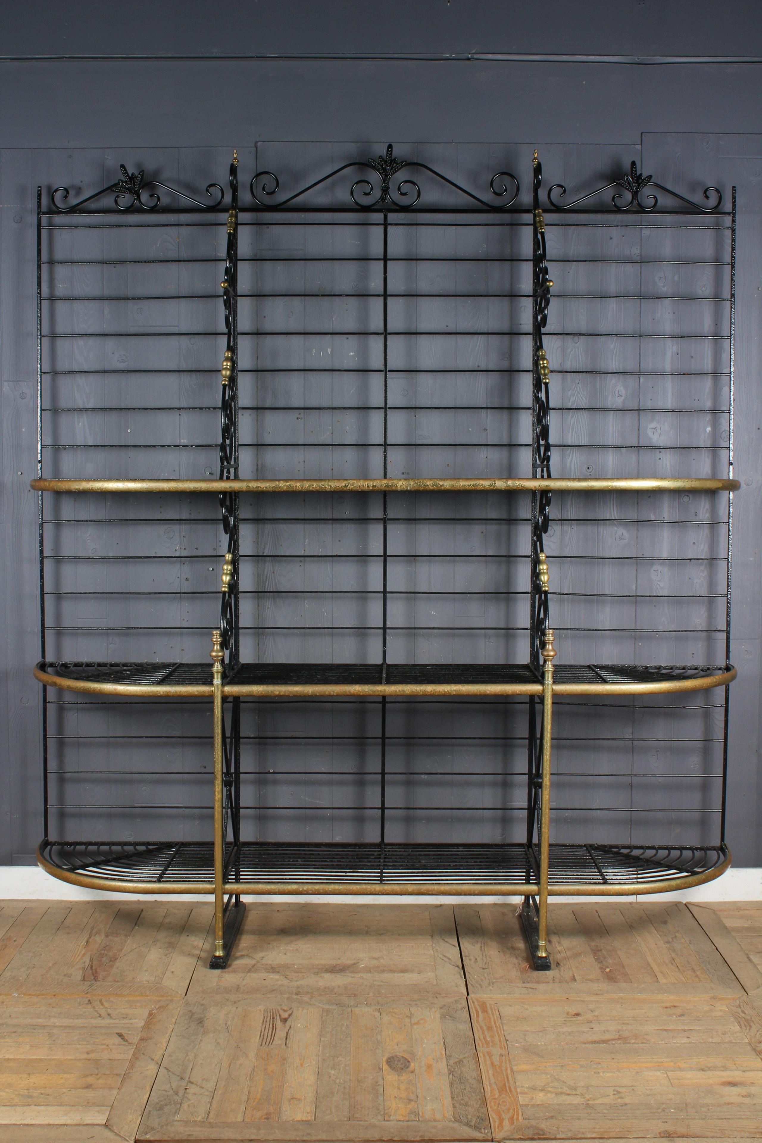 A large French style baker's rack in iron and brass, 20th century.