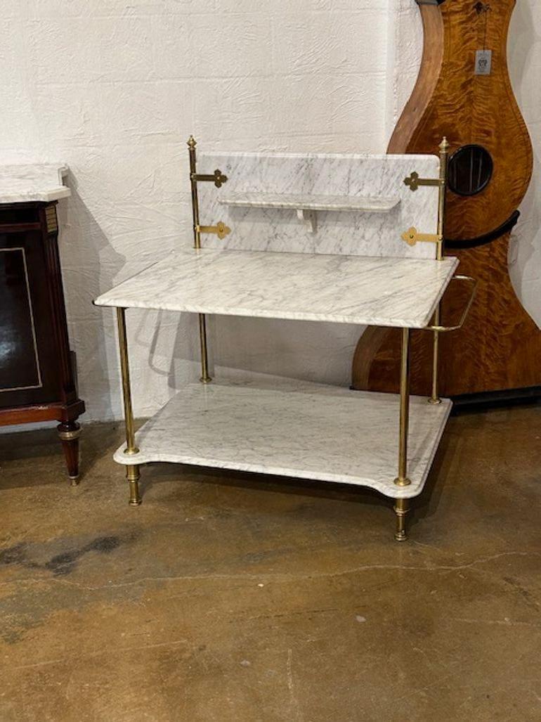 Rare antique French Carrara marble and brass bakers table. Circa 1920. Sure to make a statement