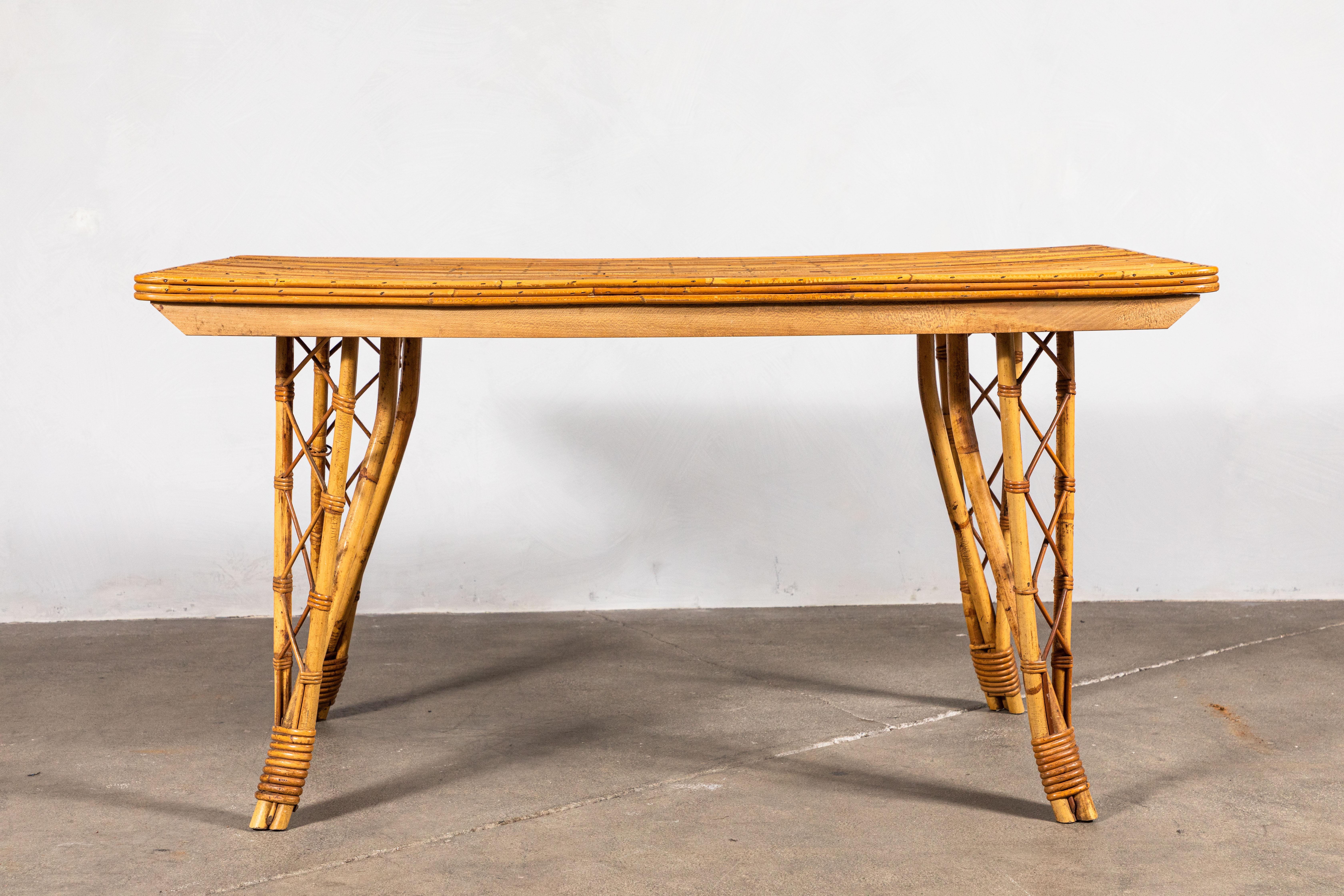 French bamboo dining table with unique and intricate details, the legs offer a zig zag triangle design.