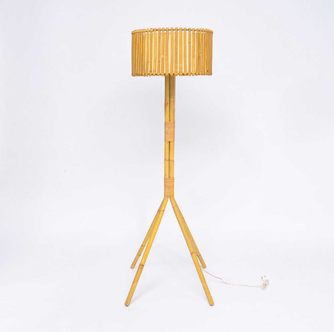 Beautiful vintage bamboo standing floor lamp. 
Imported from France. Mid century. Shade is 16 diameter. 