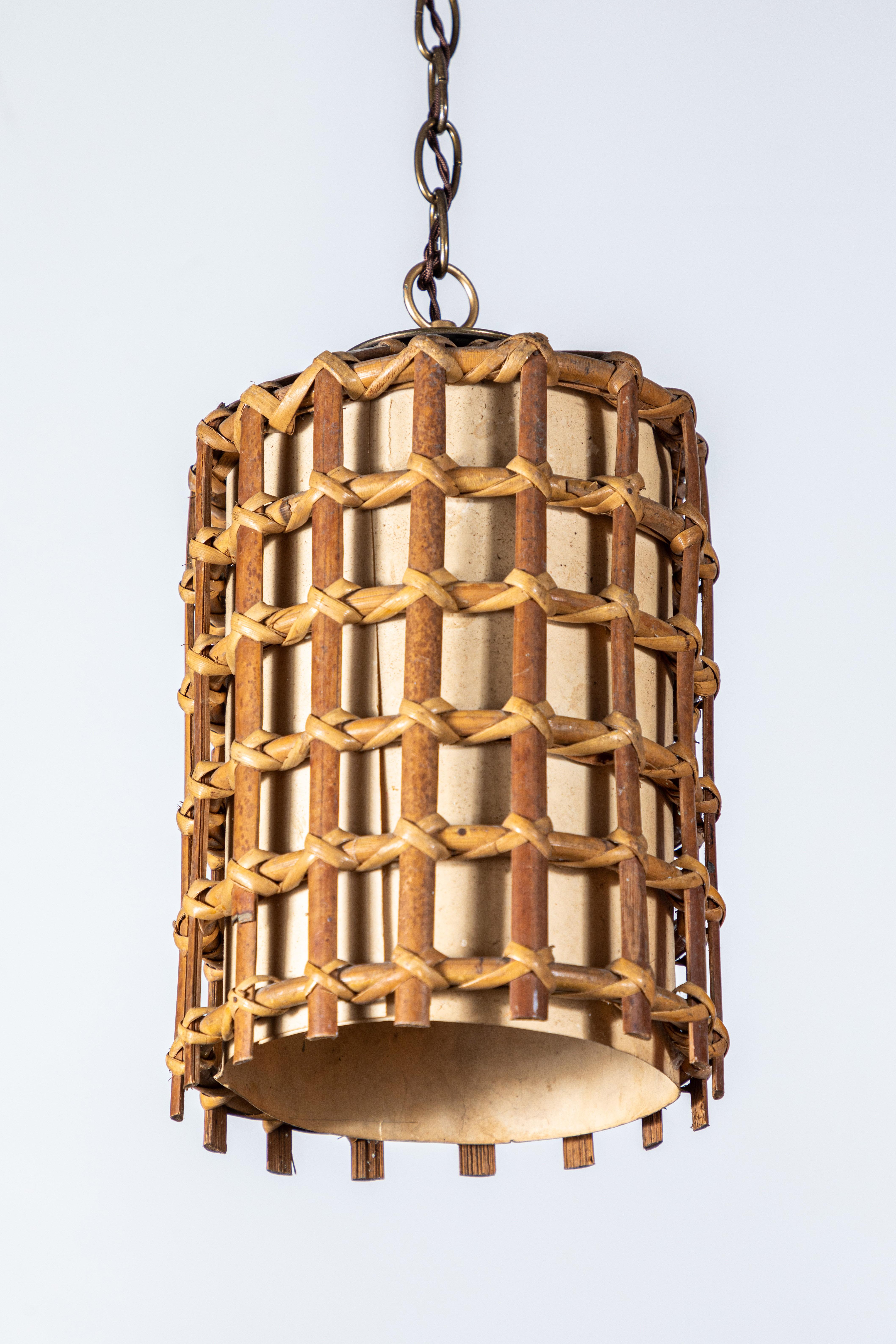 French bamboo lantern pendant with illuminated cream paper, antique brass chain and brown twist cord added. Pendant has been newly re-wired.

Two lanterns available: 
Small 8
