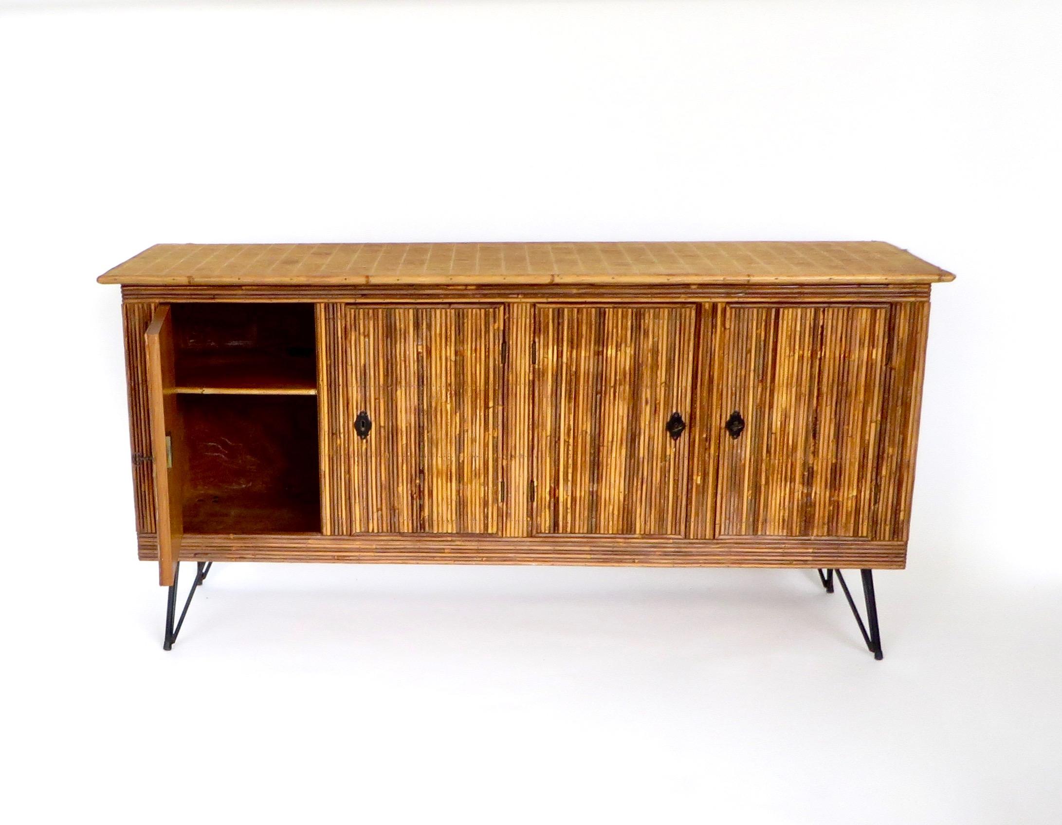 French Bamboo or Split Reed Grass Cloth Topped Four-Door Buffet on Iron Legs In Good Condition In Chicago, IL