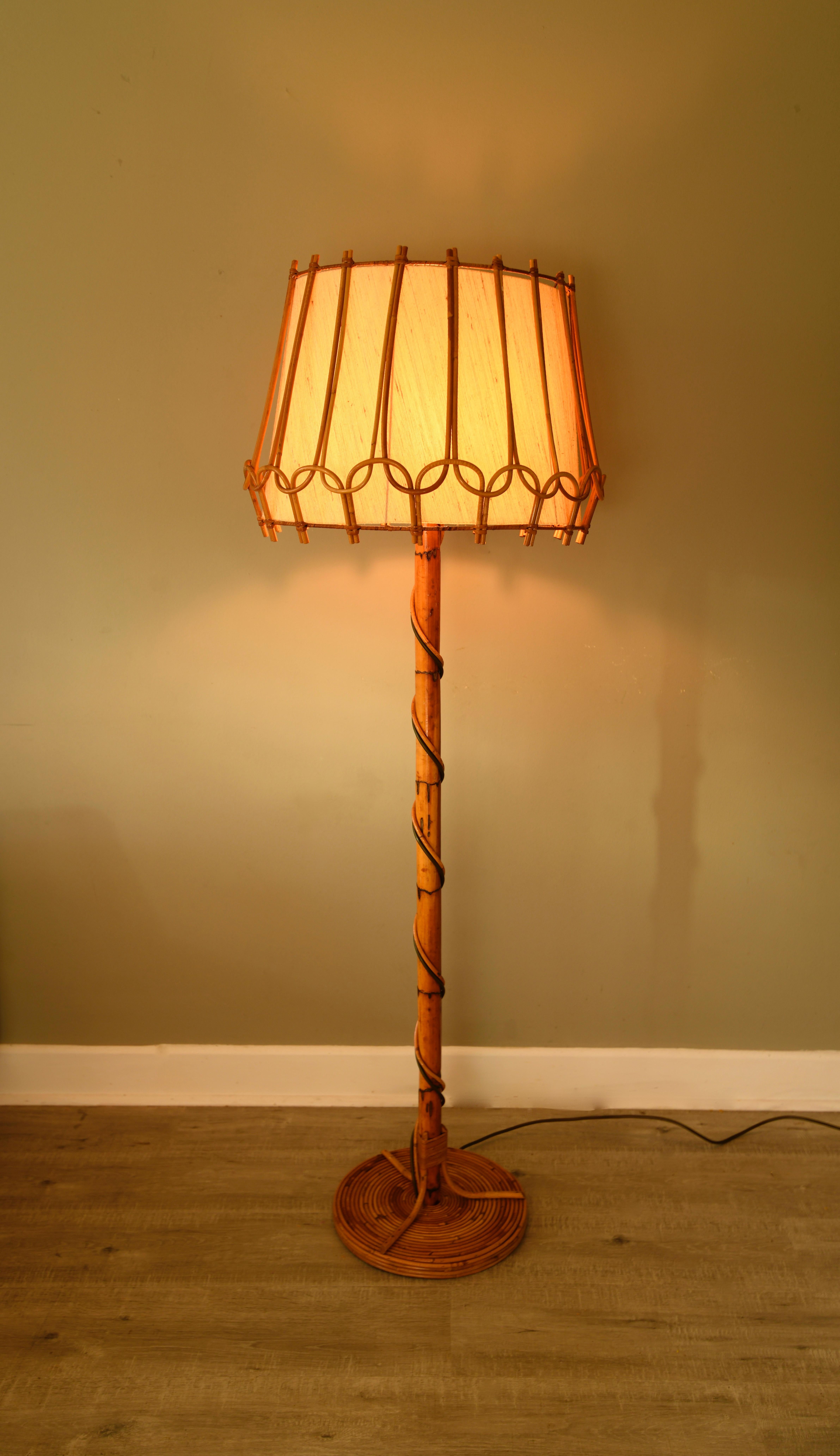 Superb French mid-century Bamboo and pencil reed floor lamp, Attributed to Louis Sognot great detailing to the base and shade,  wired for the UK market but we can re-wire to suit other standards if requested.