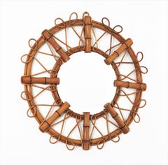 Espejo francés Sunburst de ratán y bambú, años 60