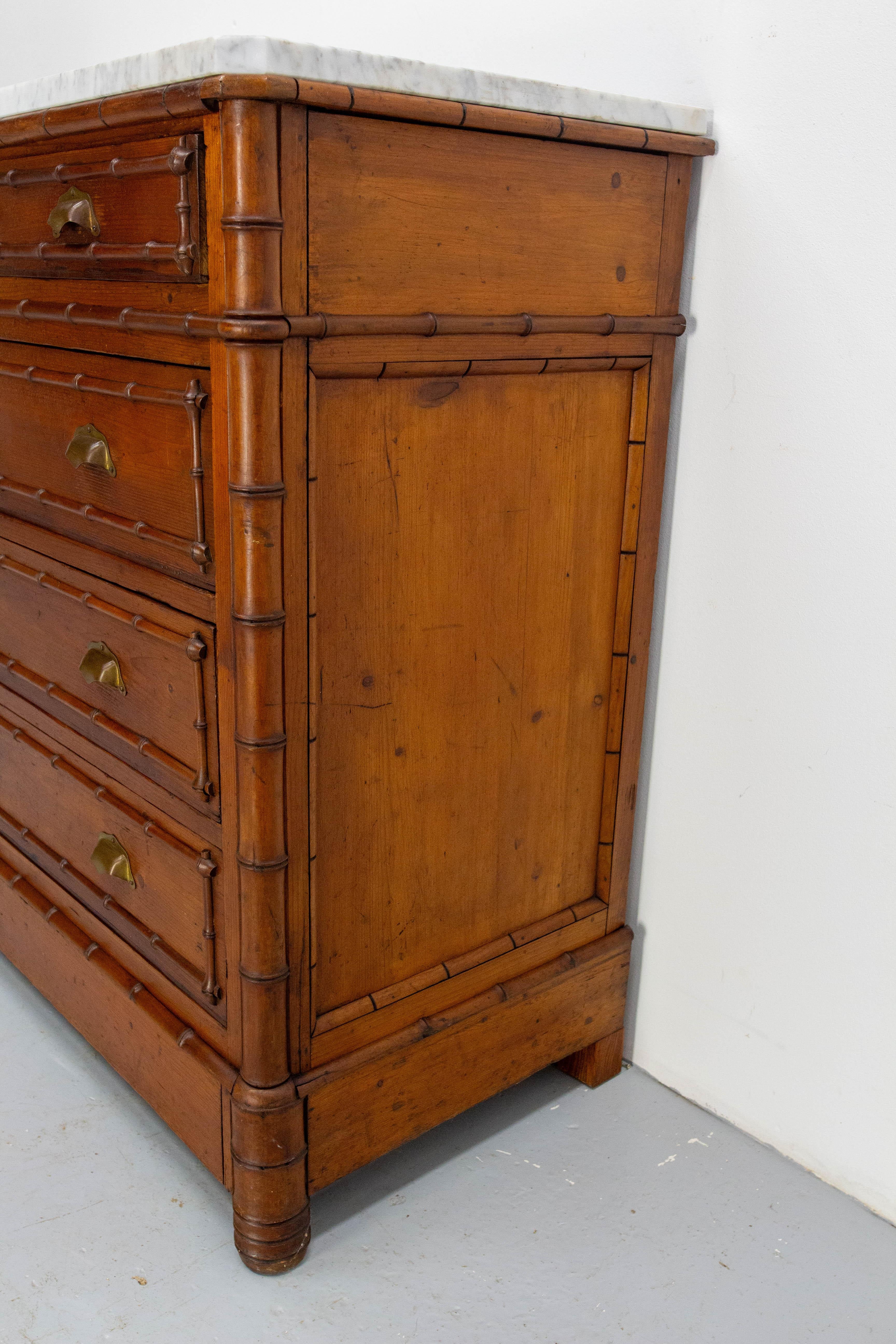 Empire French bamboo-style chest of drawers with white marble top
