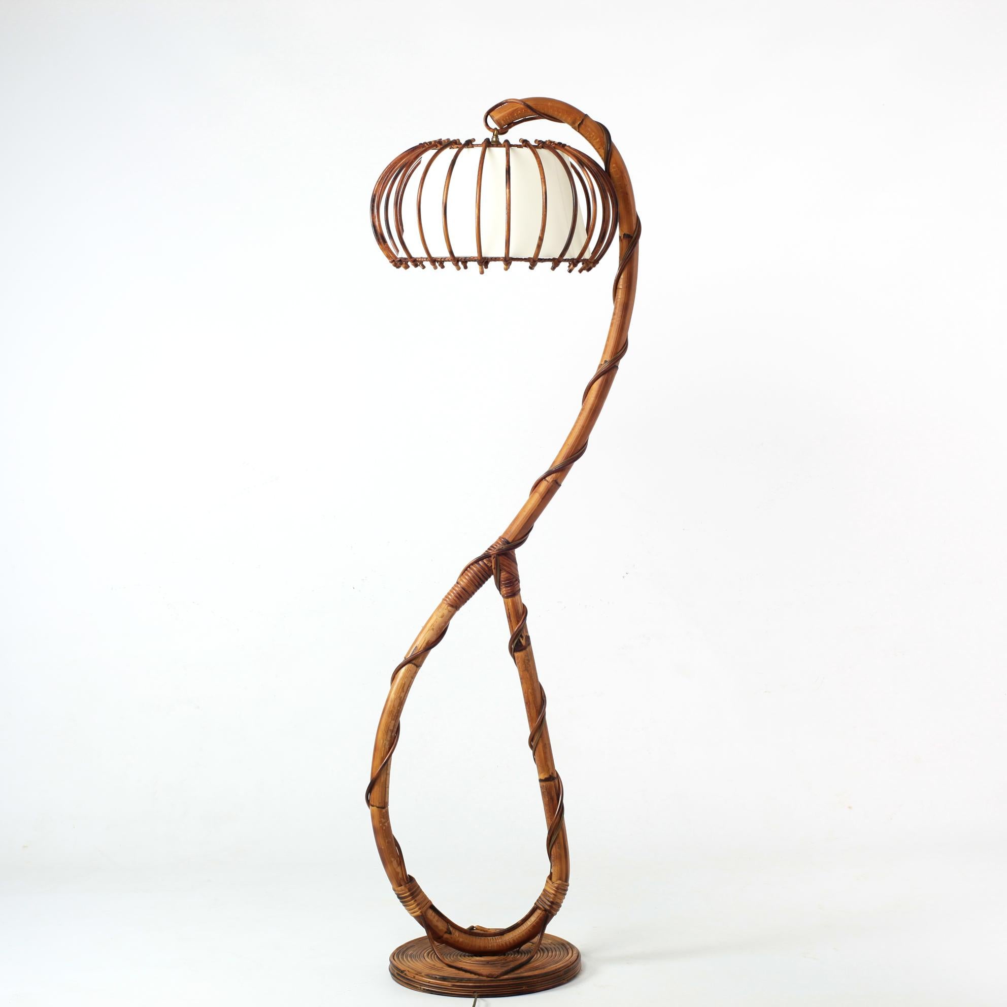 Sculptural french bambou and rattan floor lamp from 1960's
New shade
Nice warm patina
B22 socket.