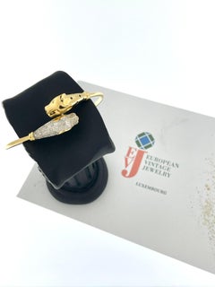 Pulsera francesa Panthère de oro de 18 quilates con diamantes y zafiros by CEMPP