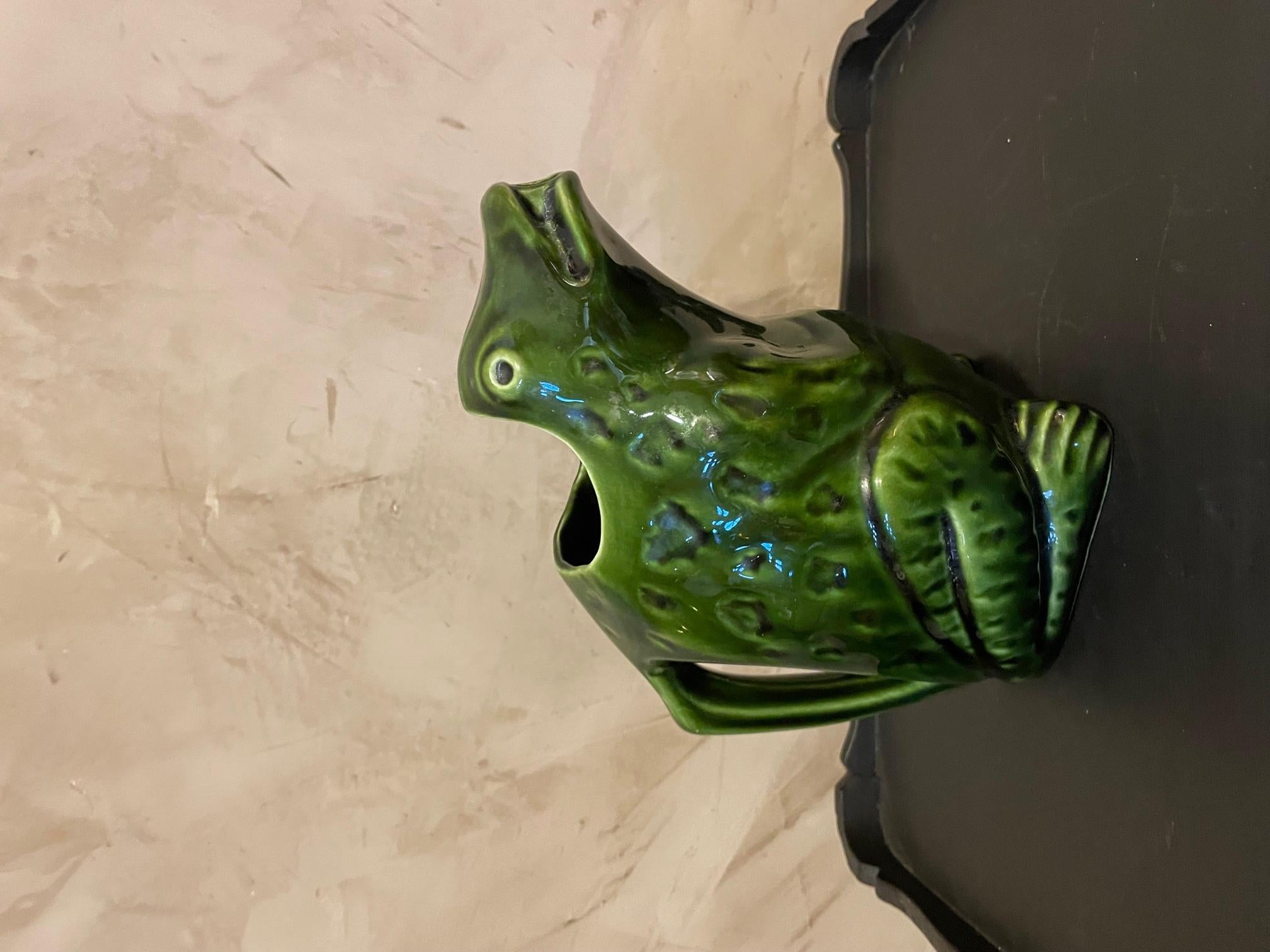 Very nice 20th century French L'héritier Guyot faience frog pitcher. 
These pitchers were used as advertising. 
We can see the name of the brand on the top of the frog. 
Nice quality and condition.