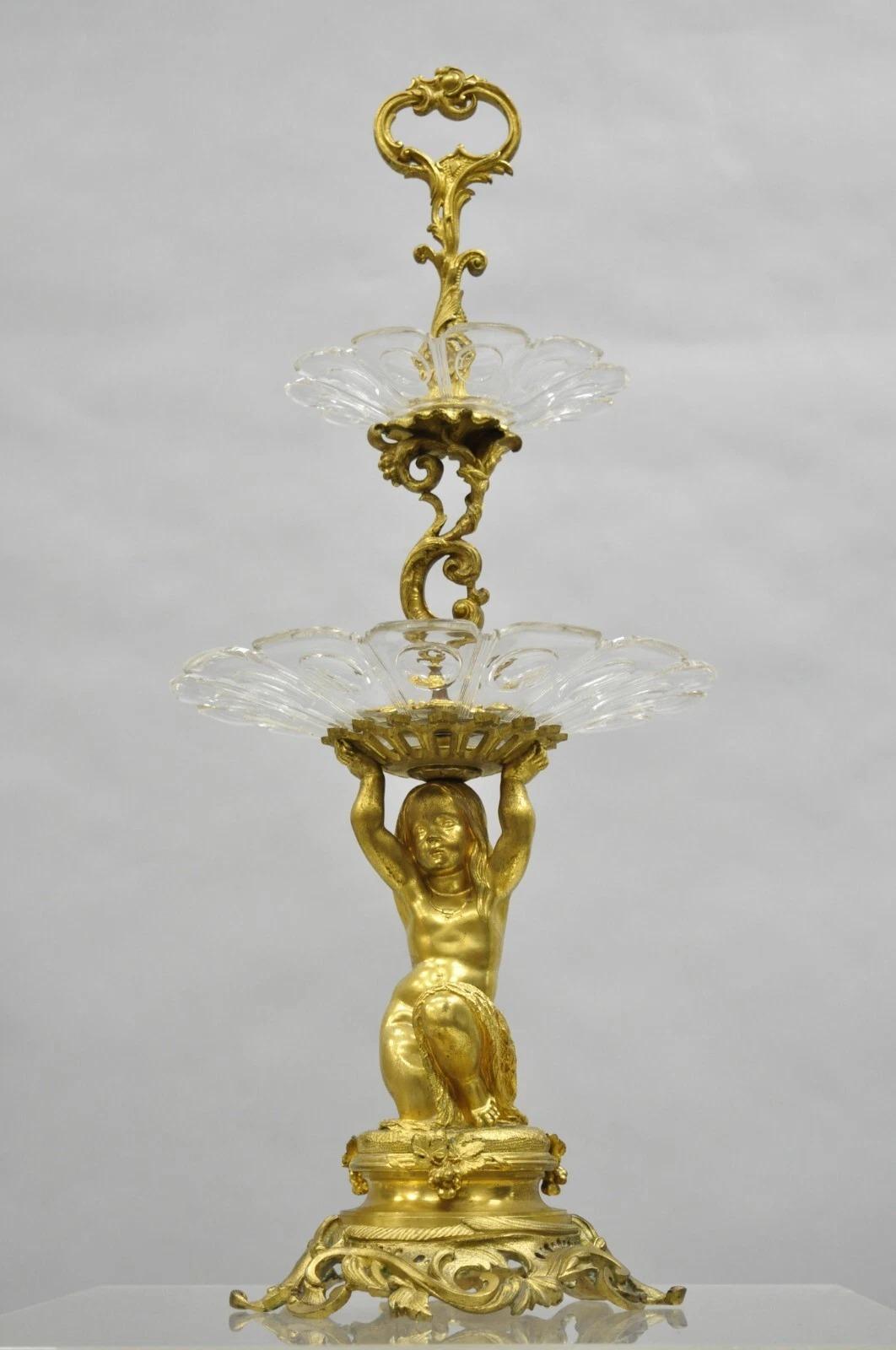 Antique French Baroque Louis XV Style Gold Gilt Bronze Cherub & Glass 2 Tier Compote Candy Dish Stand. Circa Early 20th Century. Measurements: 24