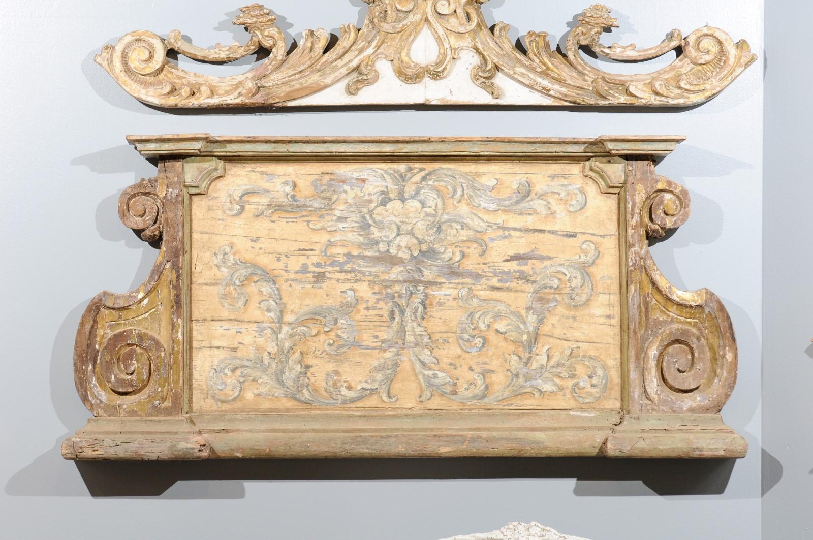 A French Baroque style painted and carved architectural panel from the 19th century, with volutes and painted scrollwork motifs. Born in France during the later years of the 19th century, this exquisite French architectural panel captures our