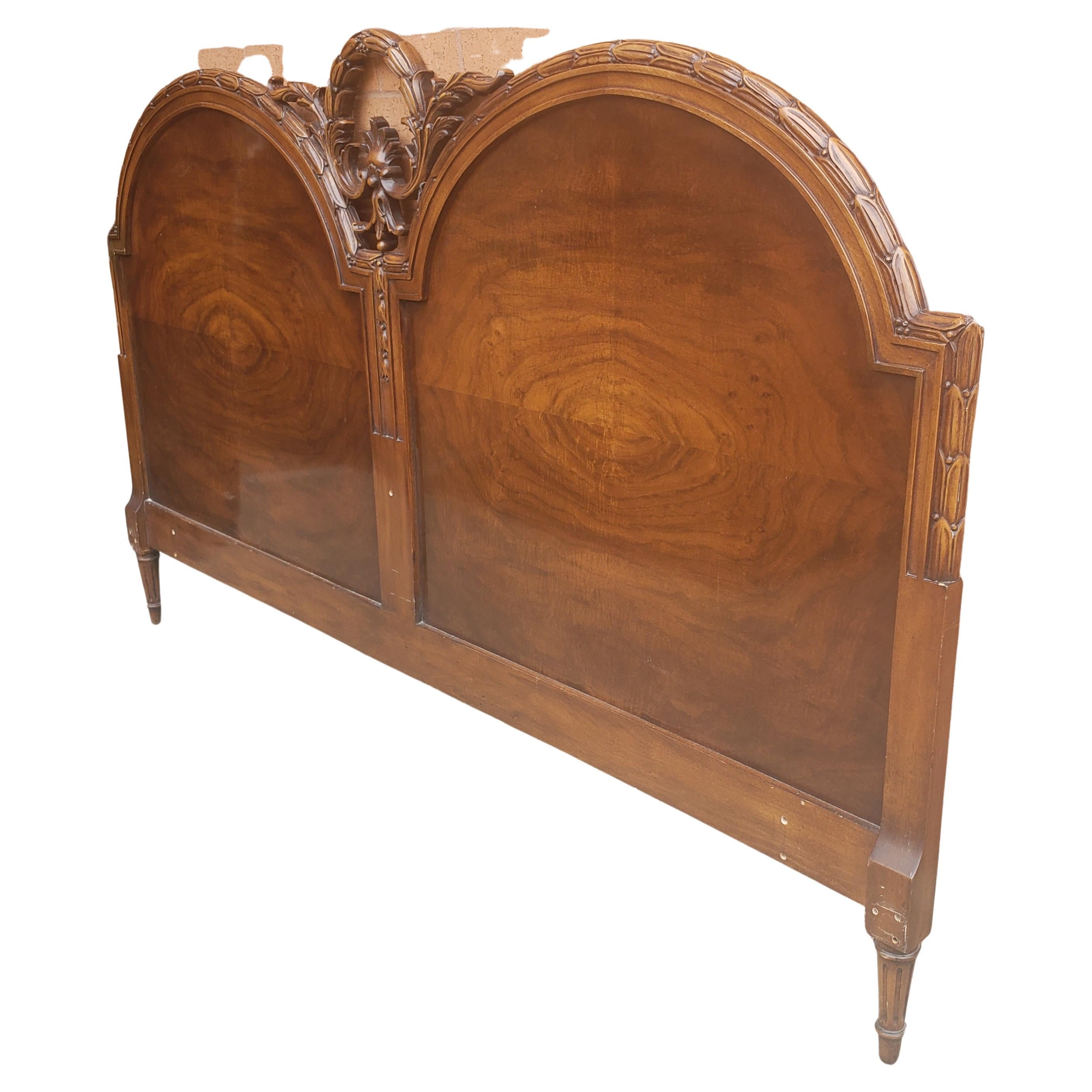 A monumental French baroque style carved mahogany king size headboard in excellent vintage condition.
Measures 78.5 inches in width and stands 45.5 inches tall.