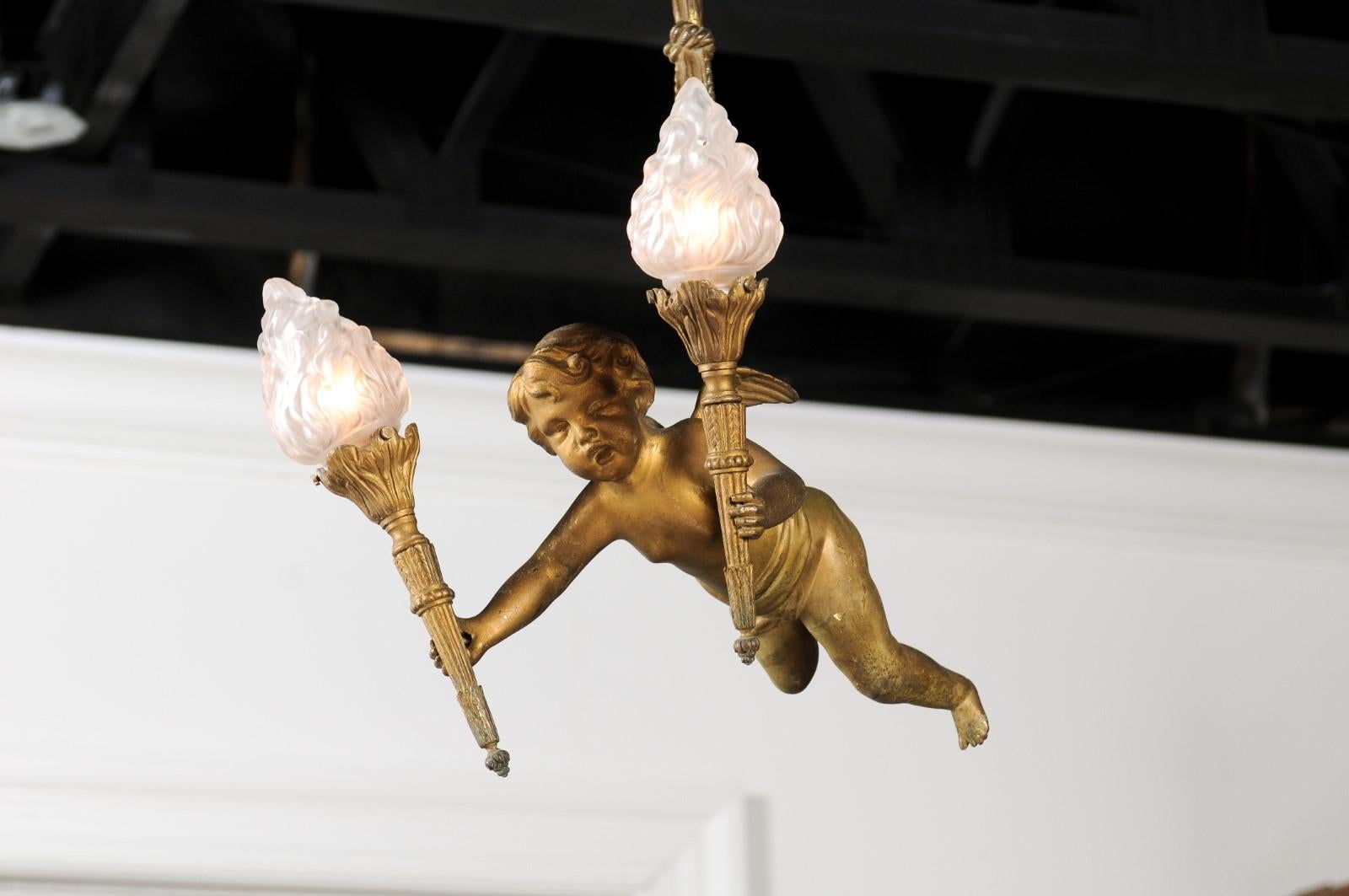 French Baroque Style Gilt Bronze Chandelier with Cherub Holding Two Torches In Good Condition In Atlanta, GA