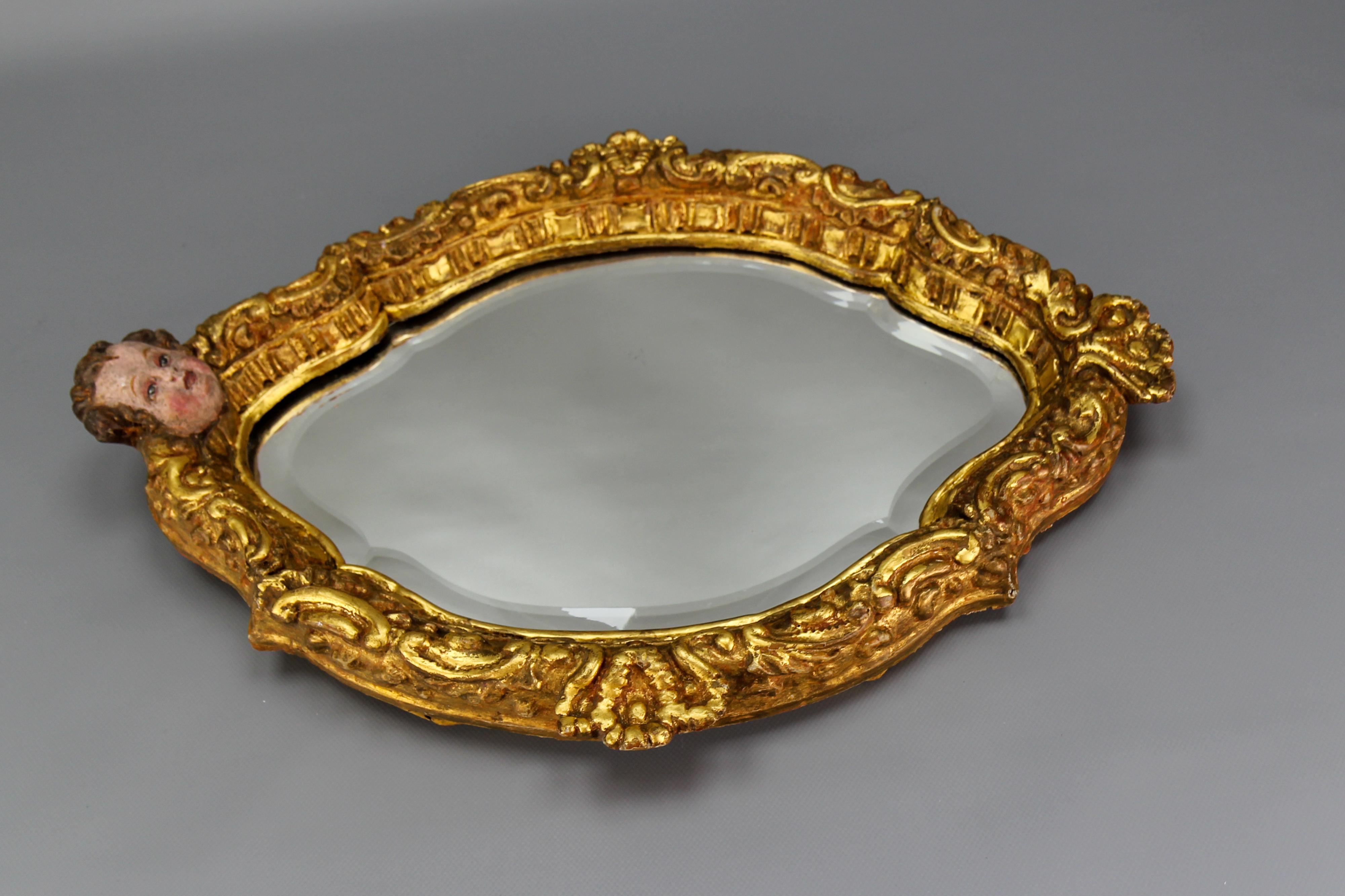 French Baroque Style Gilt Wood Wall Mirror with a Cherub Head For Sale 8