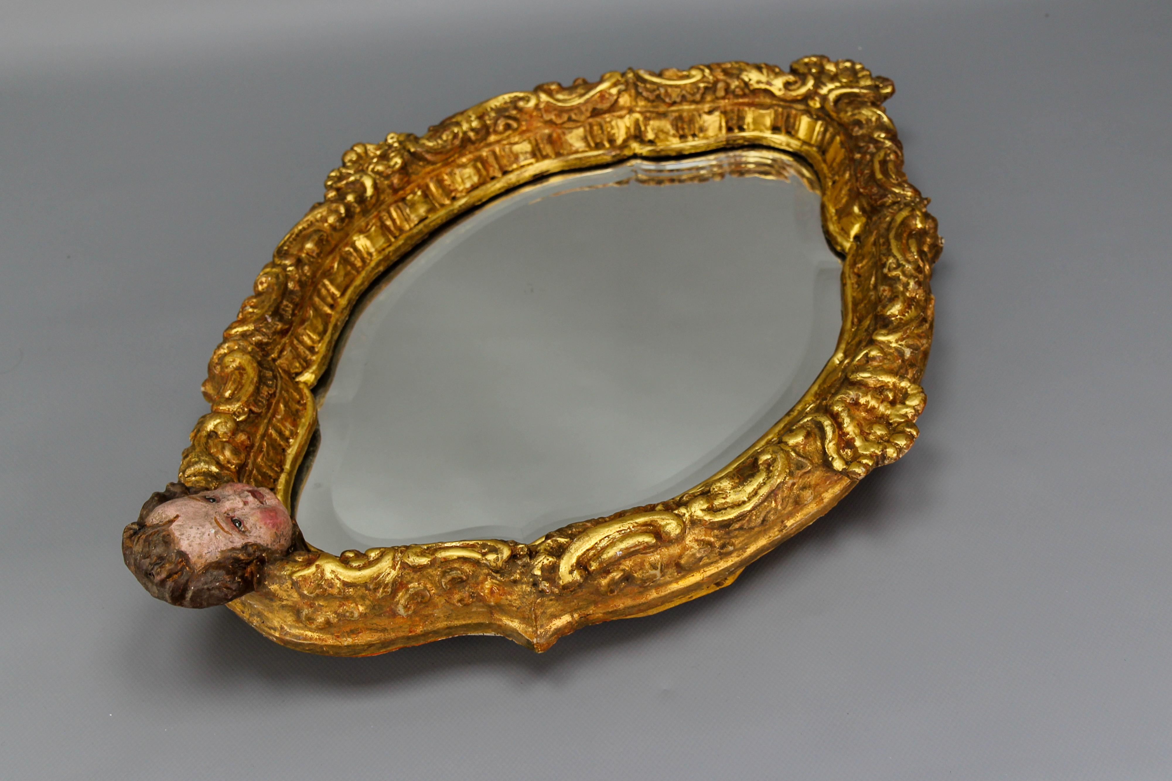 French Baroque Style Gilt Wood Wall Mirror with a Cherub Head For Sale 9
