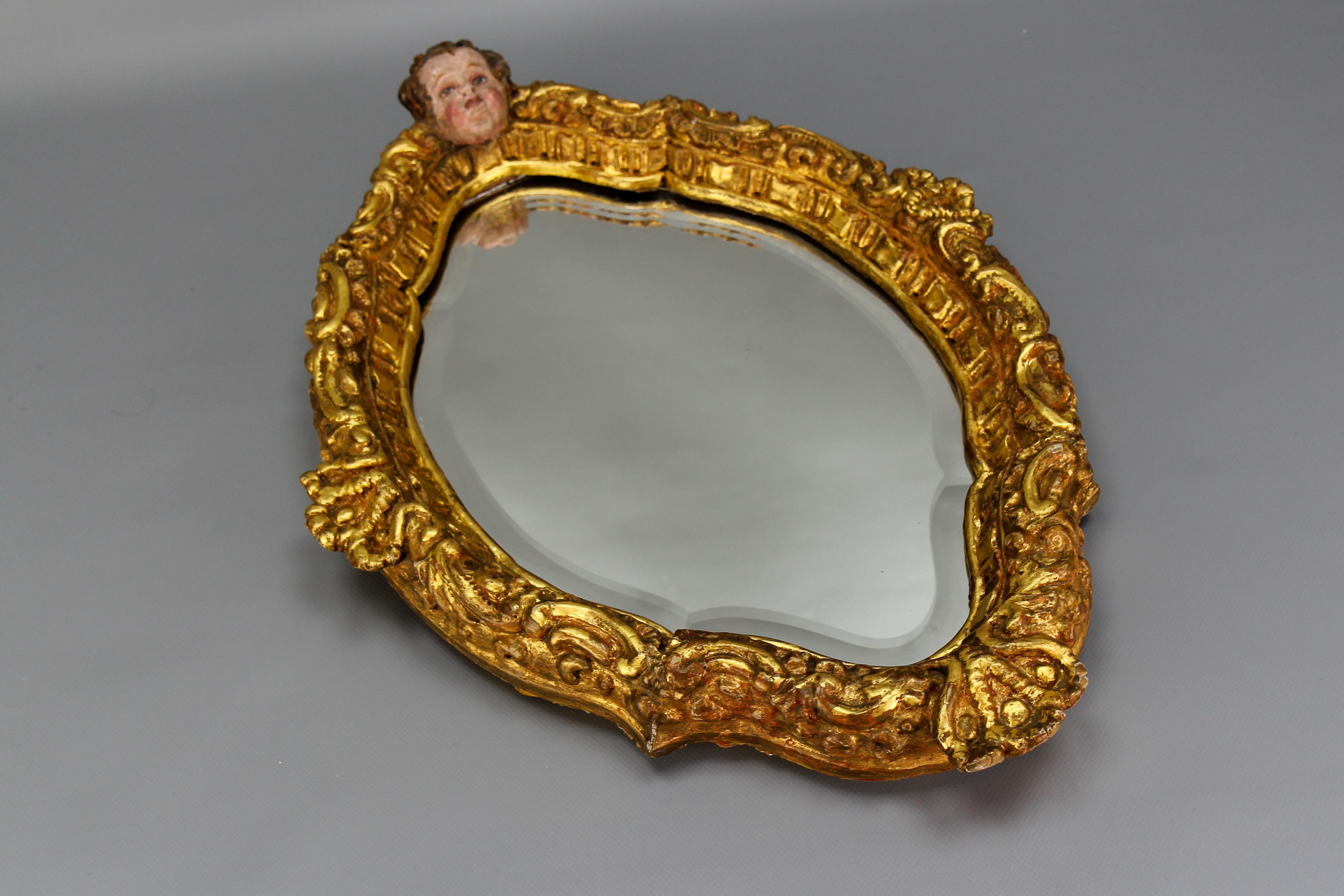 French Baroque Style Gilt Wood Wall Mirror with a Cherub Head For Sale 11