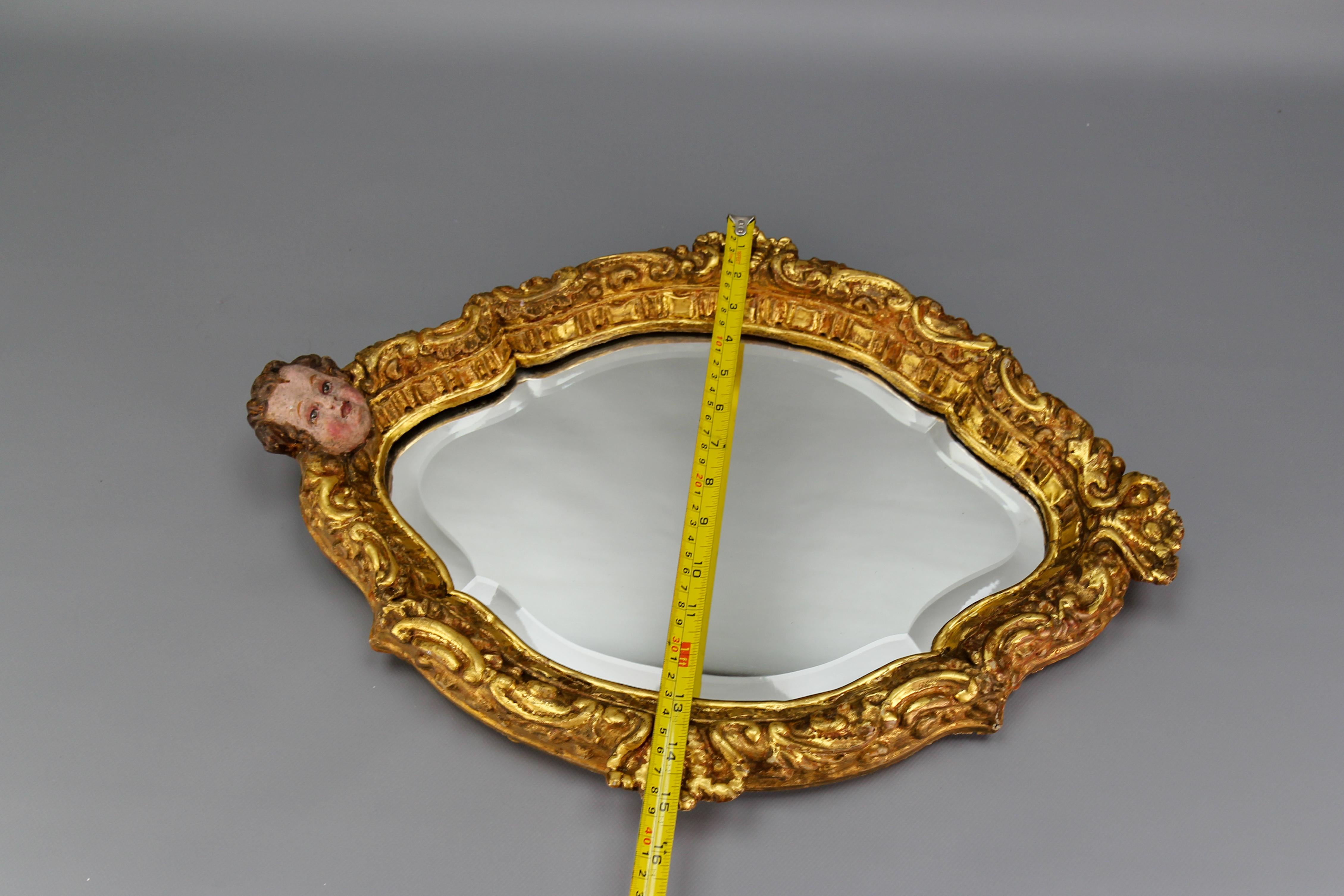French Baroque Style Gilt Wood Wall Mirror with a Cherub Head For Sale 15