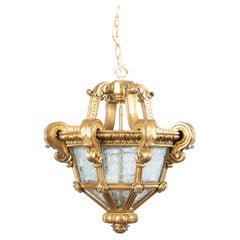 French Baroque Style Giltwood Lantern with Carved Volutes and Textured Glass