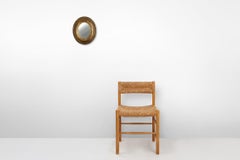 French Baroque style oval mirror in gilded wood with floral decorations